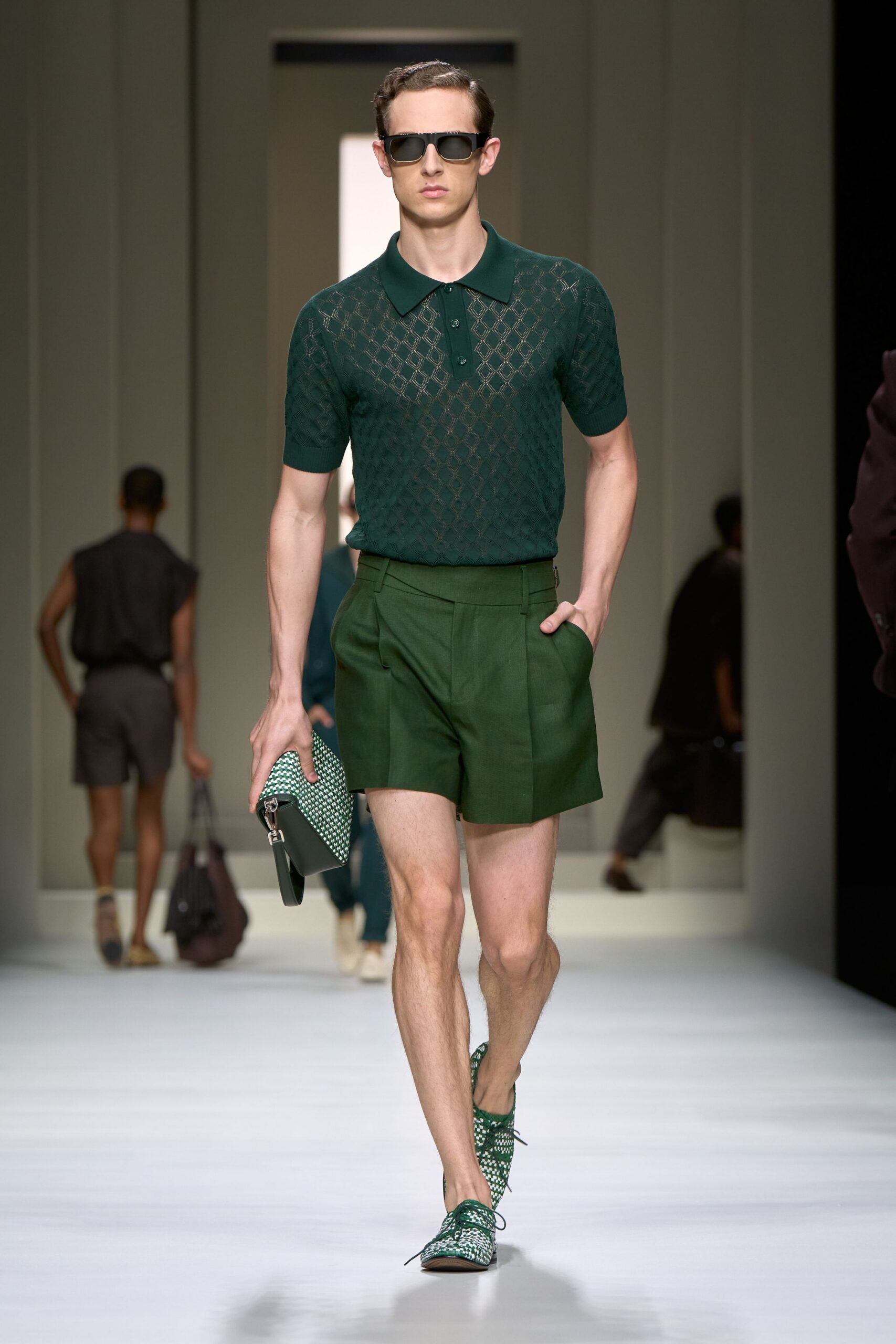 green textured shirt and shorts