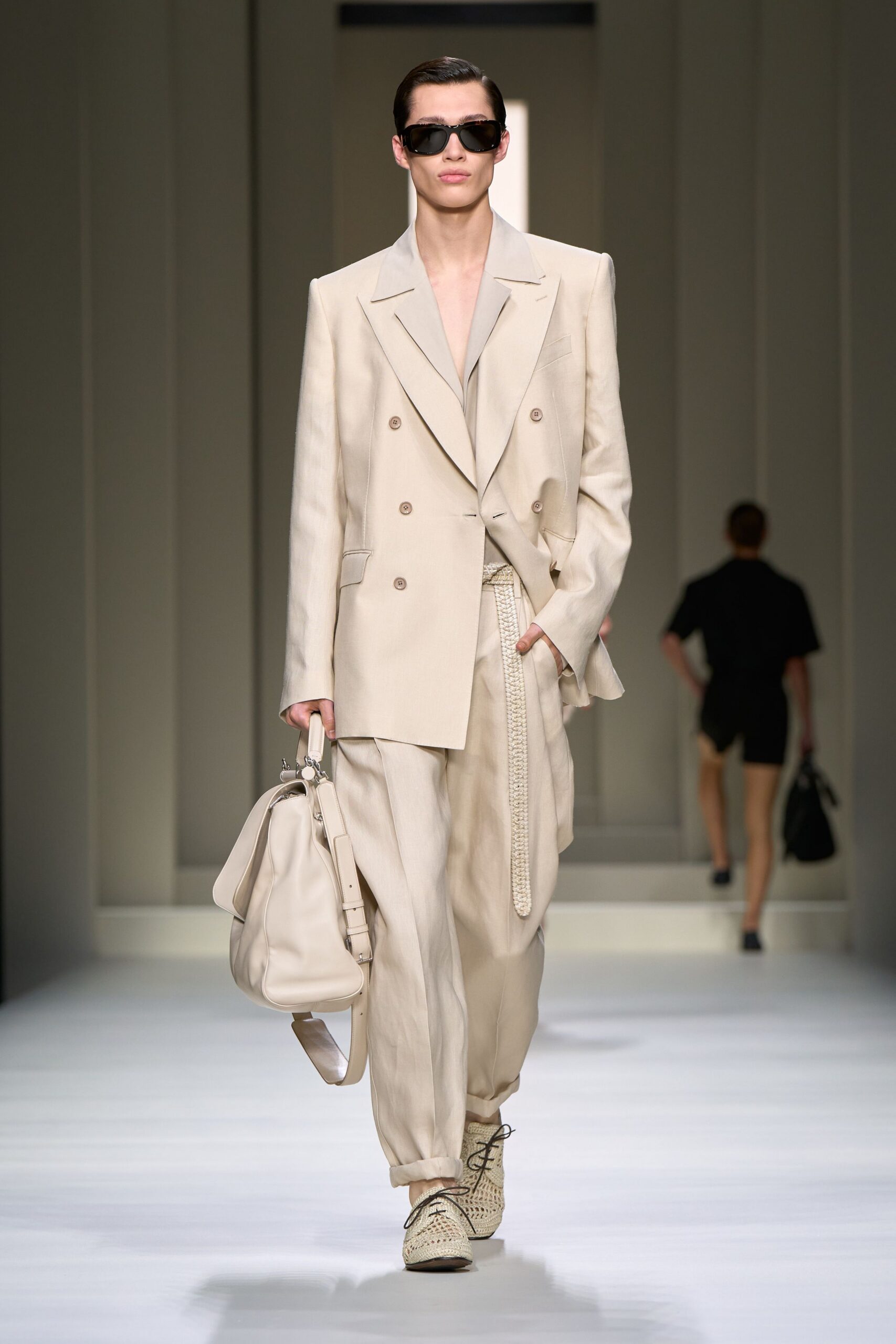 beige linen suit with sunglasses