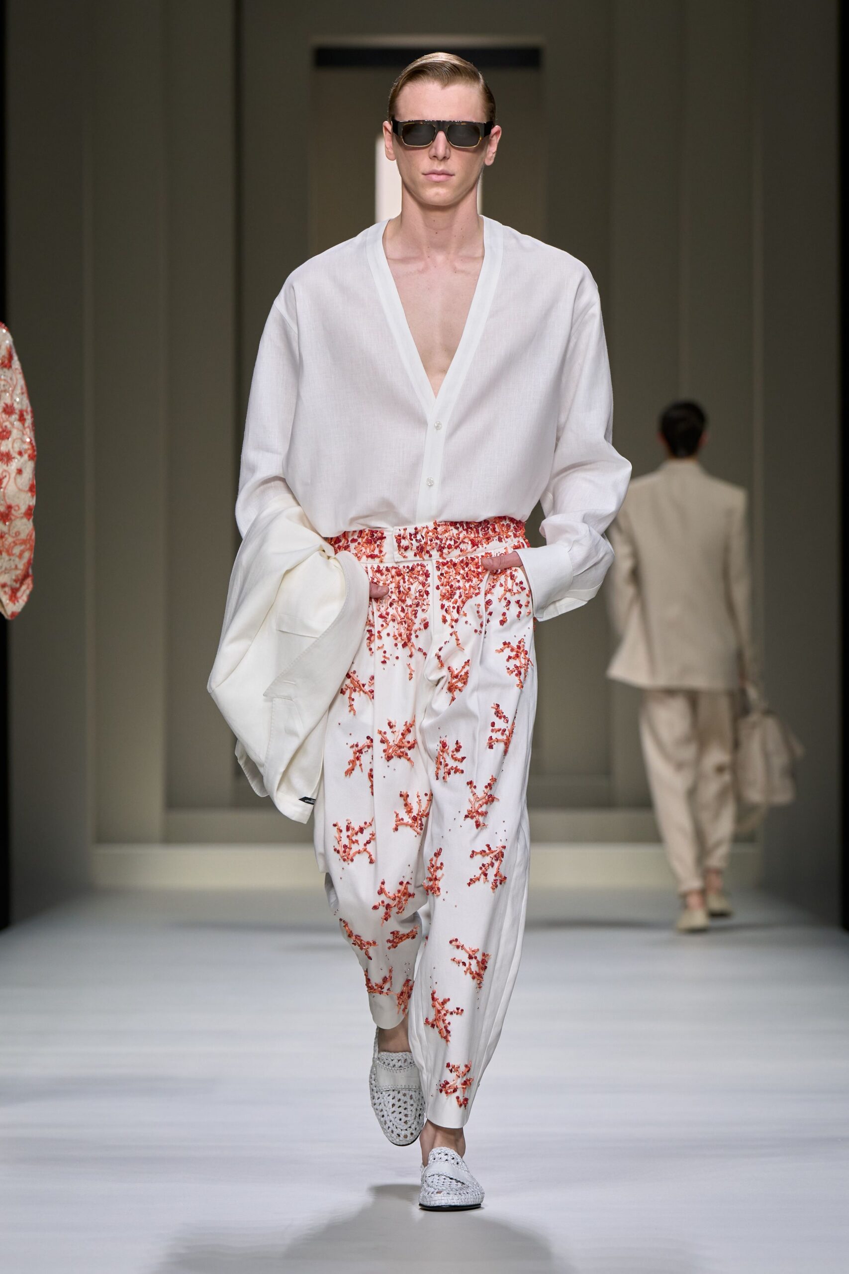 white relaxed shirt with printed pants