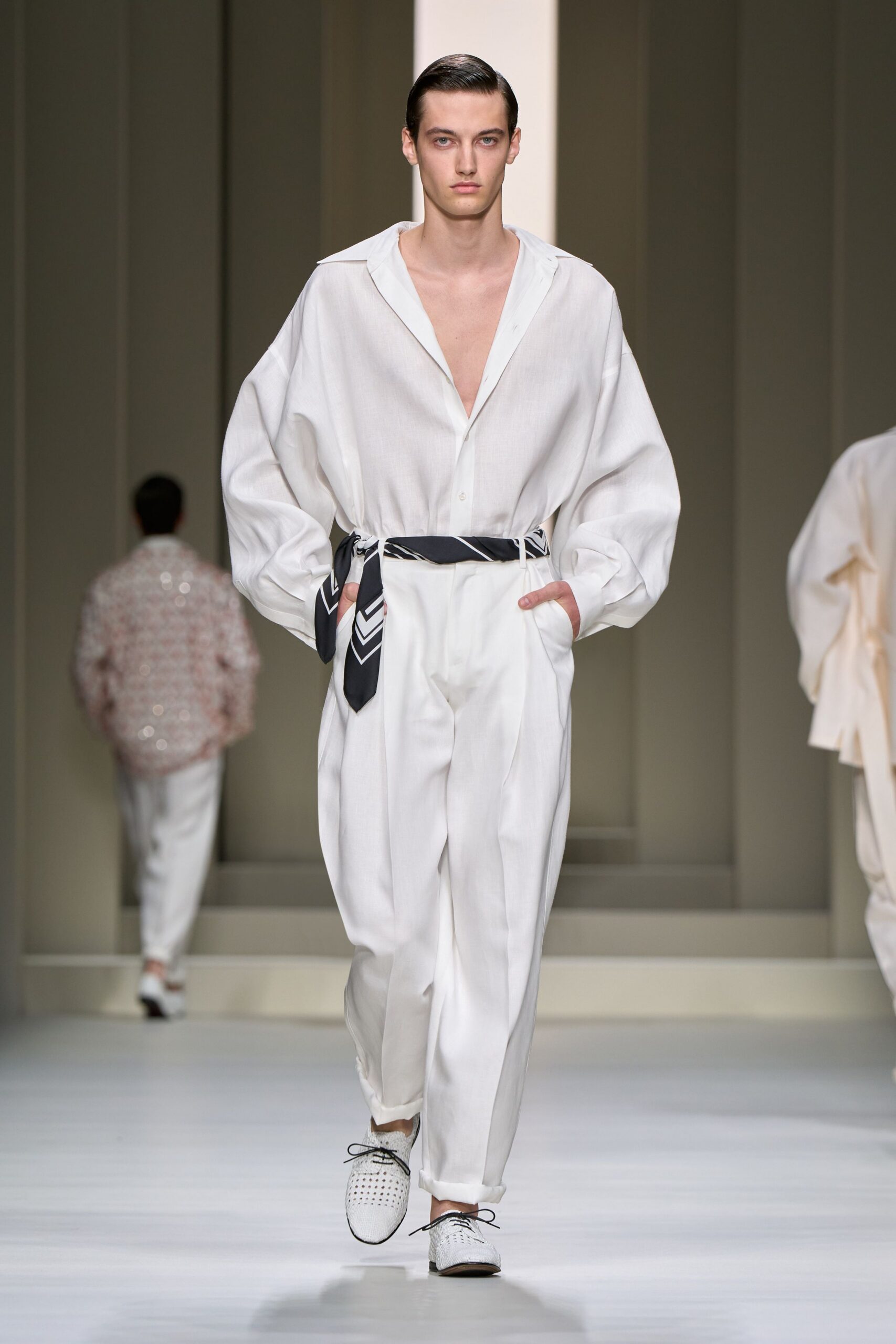 white oversized shirt with relaxed pants