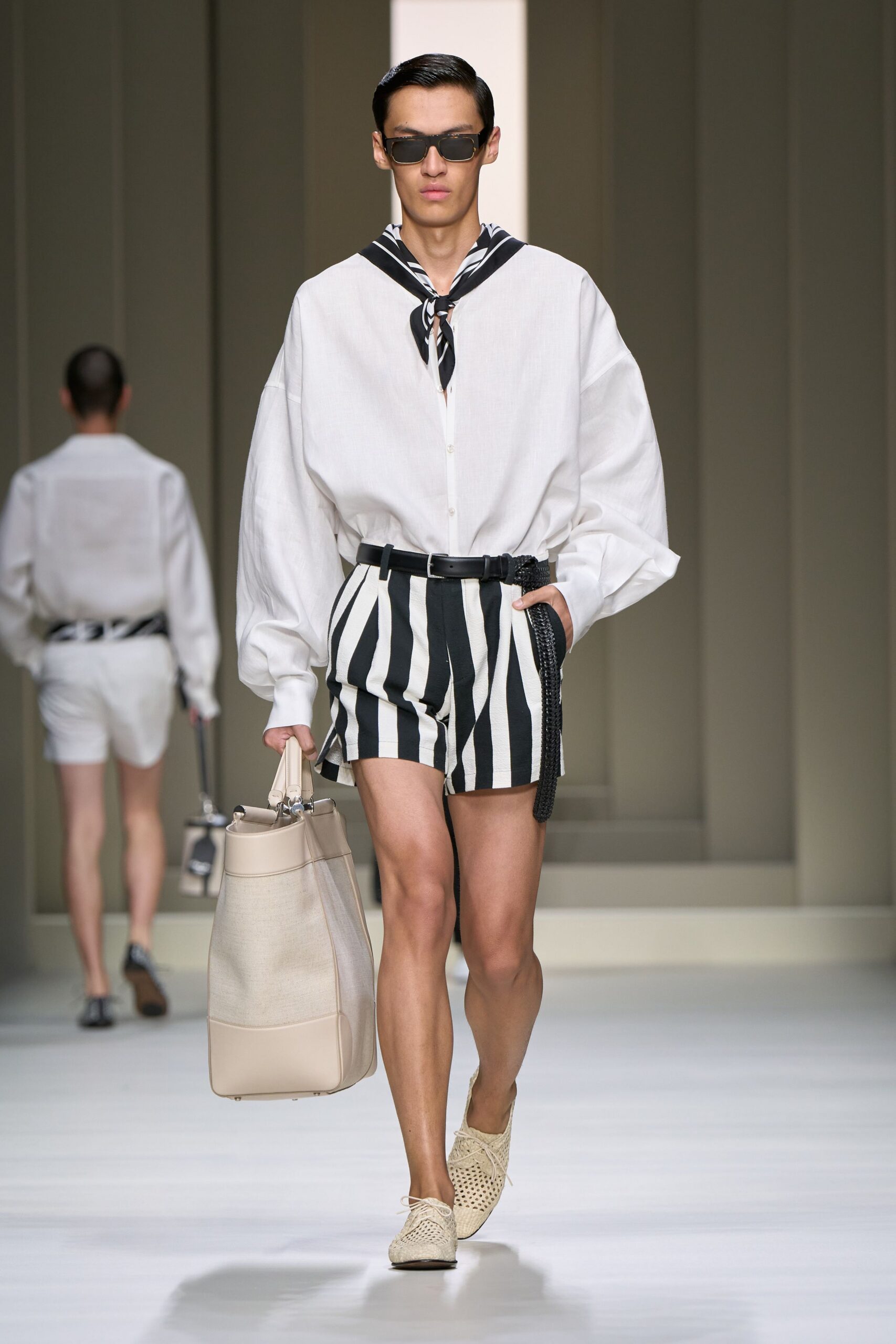 white relaxed shirt with striped shorts