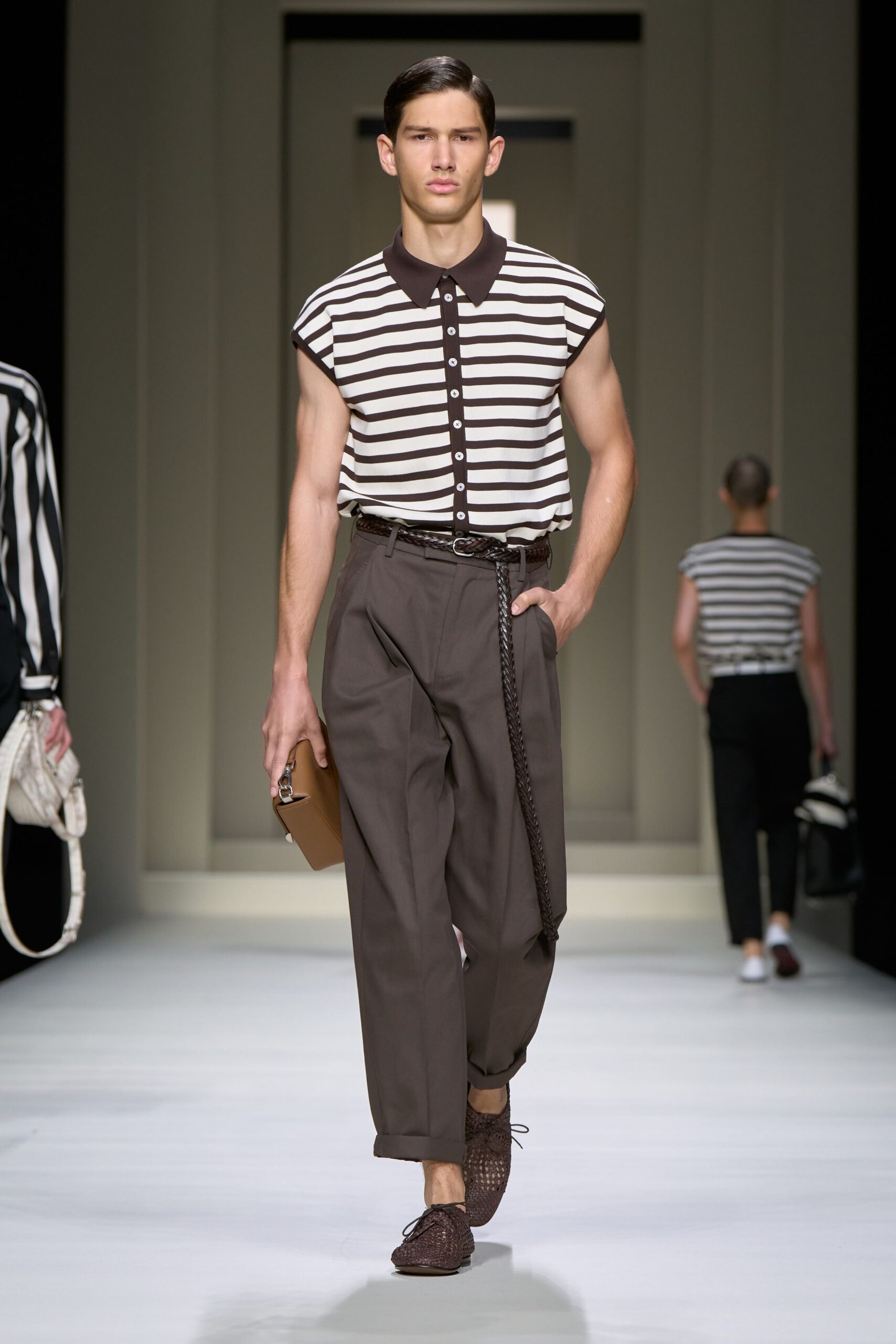 striped shirt and brown pants