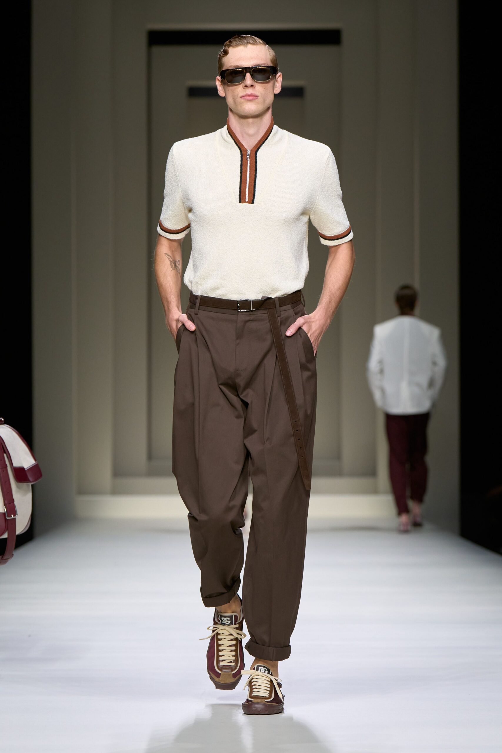 fitted white shirt with brown pants