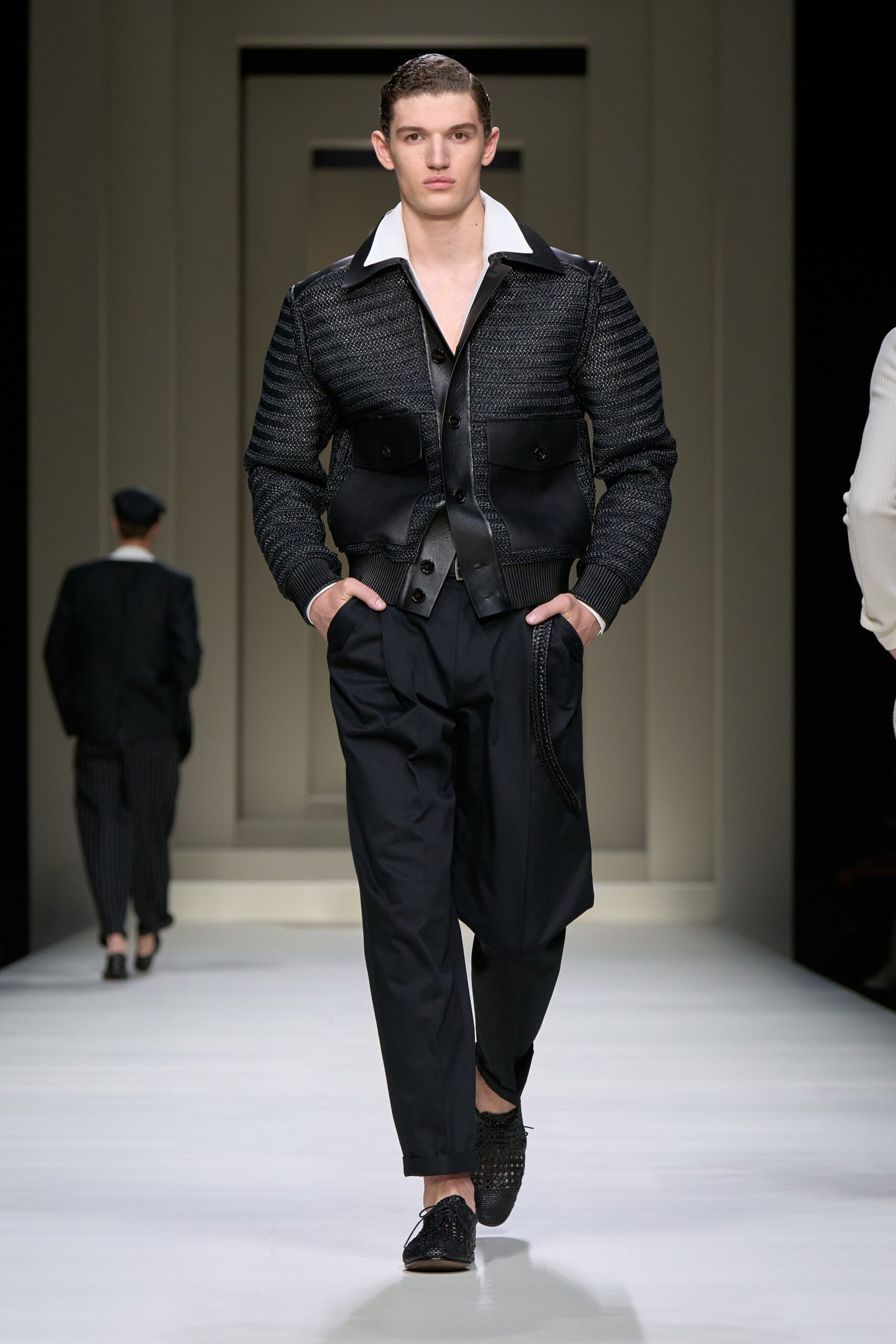 black structured jacket with relaxed pants
