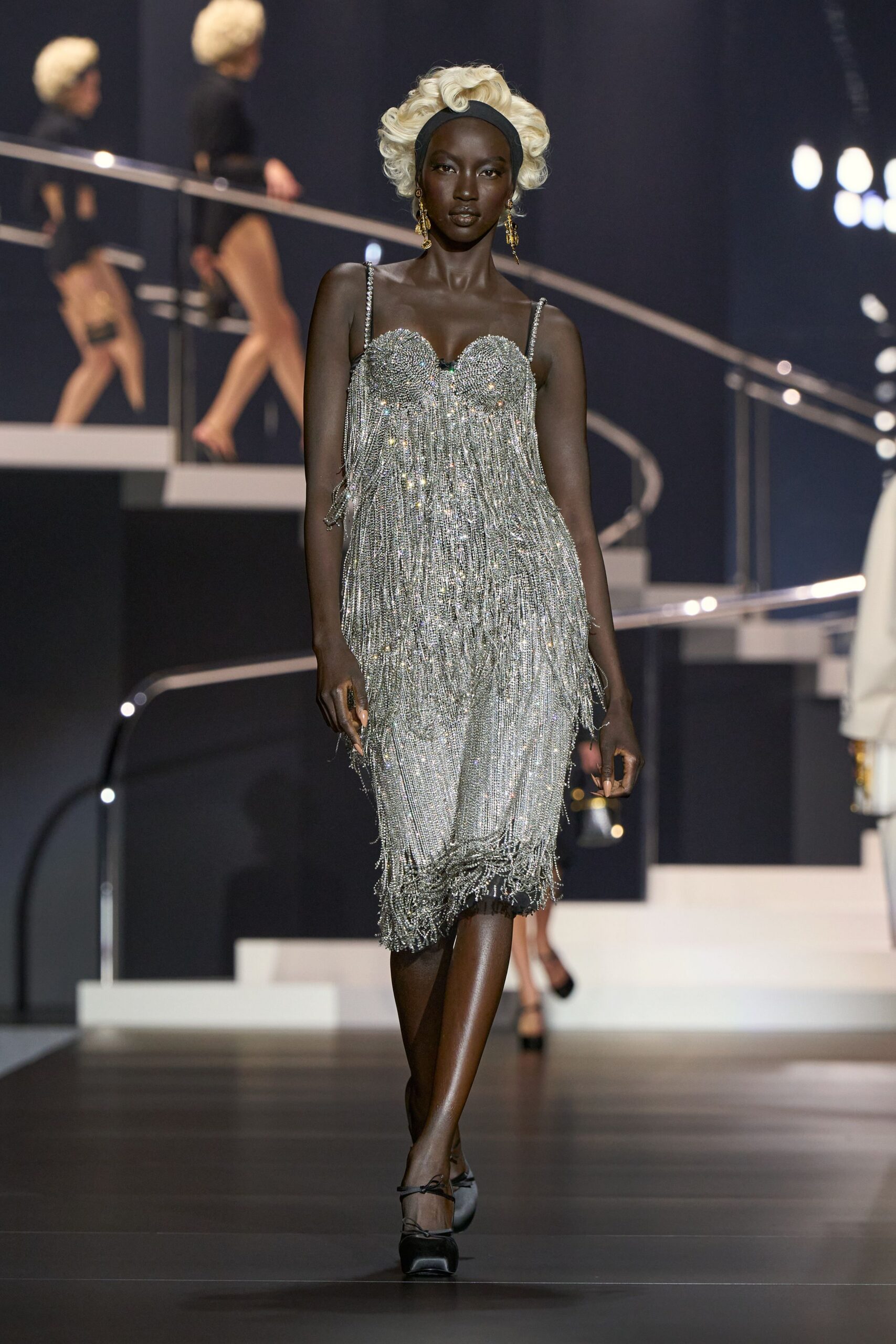silver fringed mini dress with black shoes