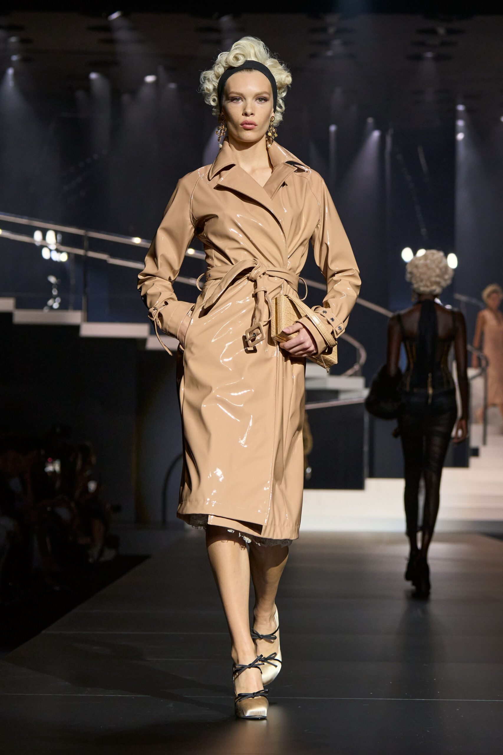 beige vinyl belted trench coat