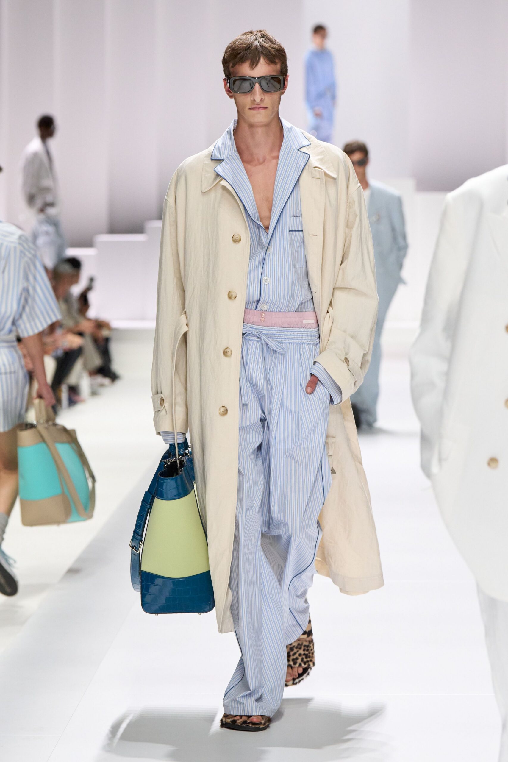 beige coat with striped shirt and pants