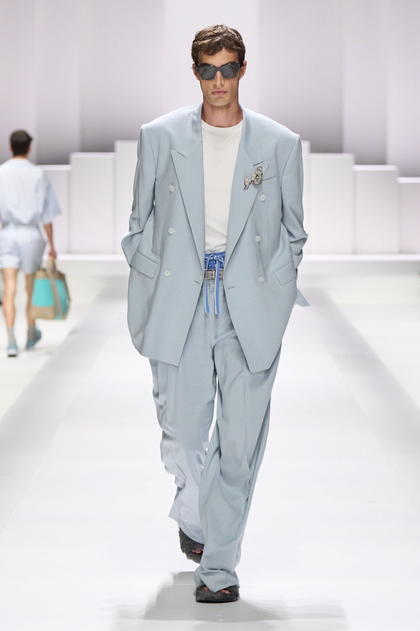 blue tailored suit with white t-shirt