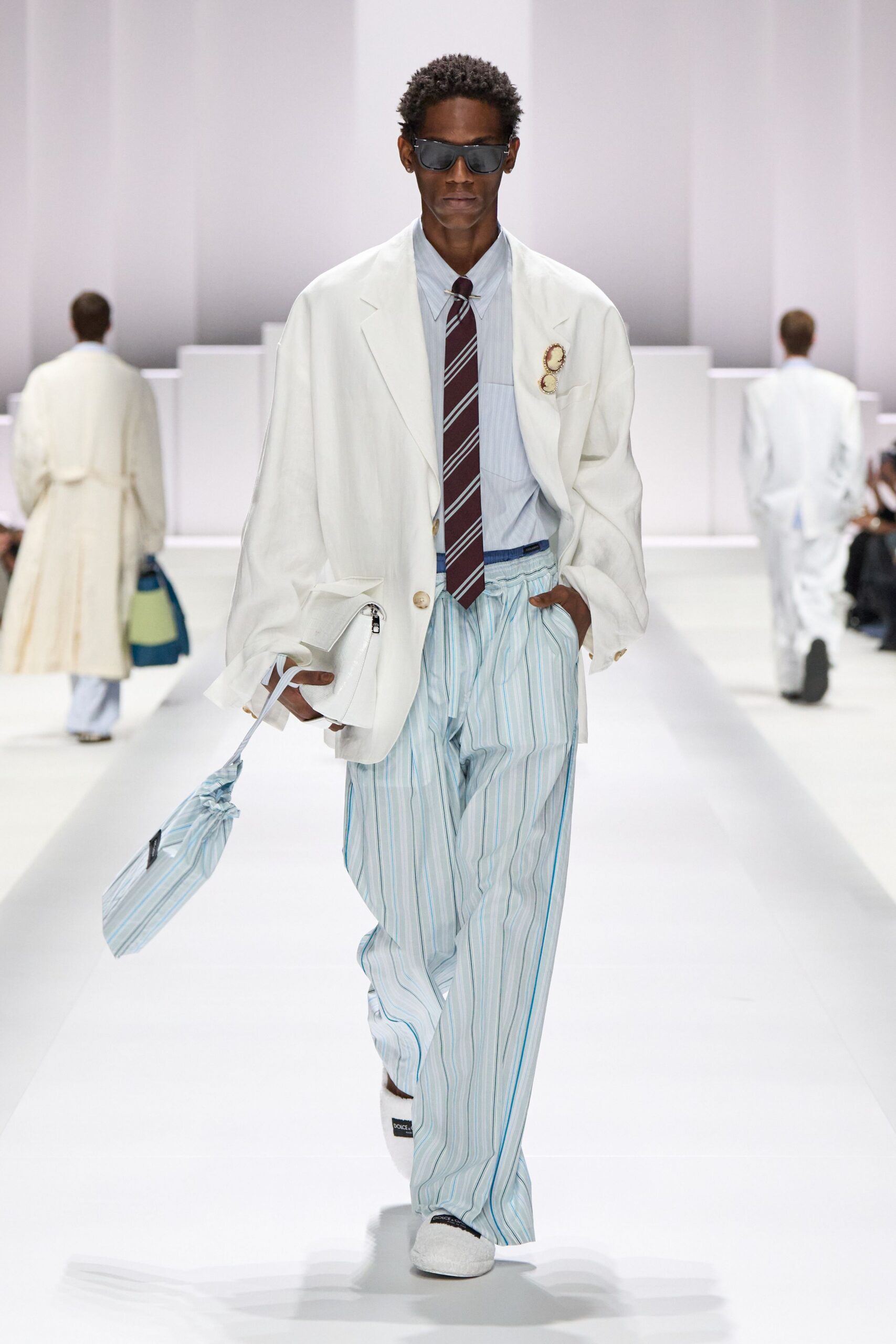 white blazer with striped shirt and pants