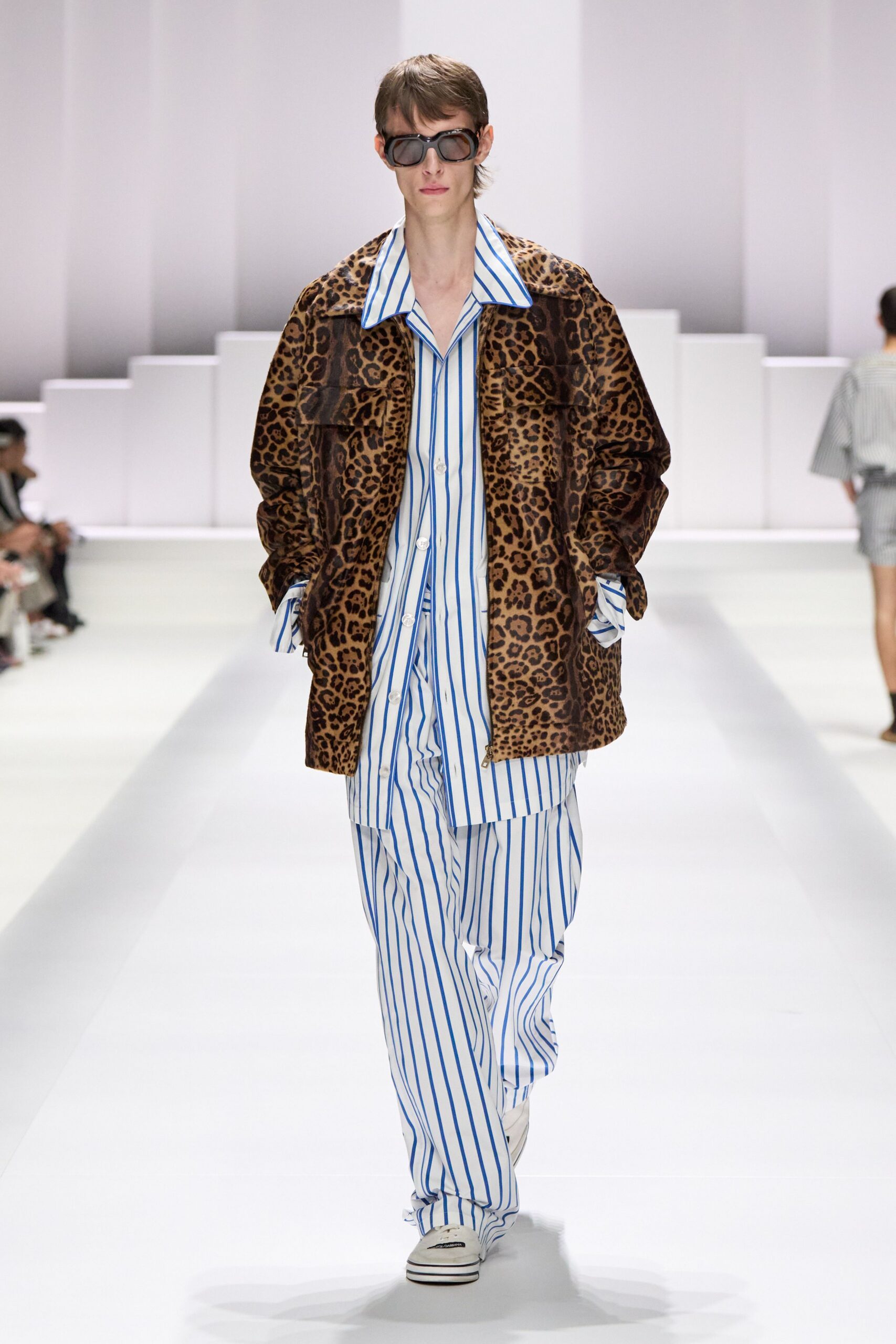 brown faux-fur coat with striped shirt and pants