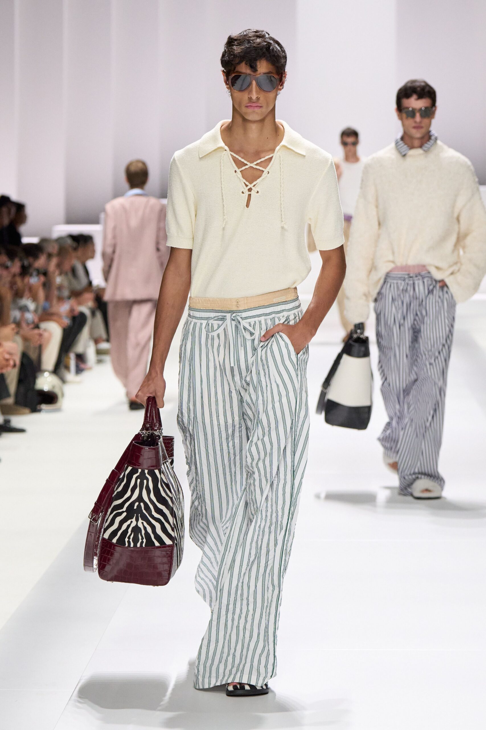 white relaxed top with striped pants