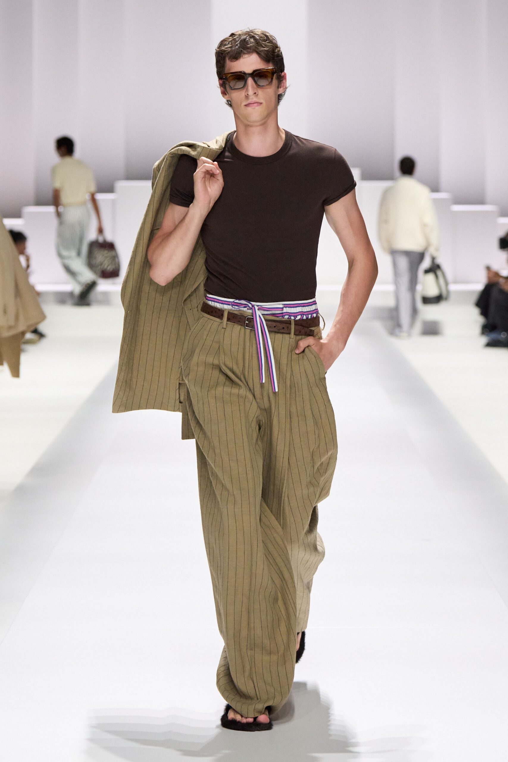 brown fitted t-shirt and beige striped pants