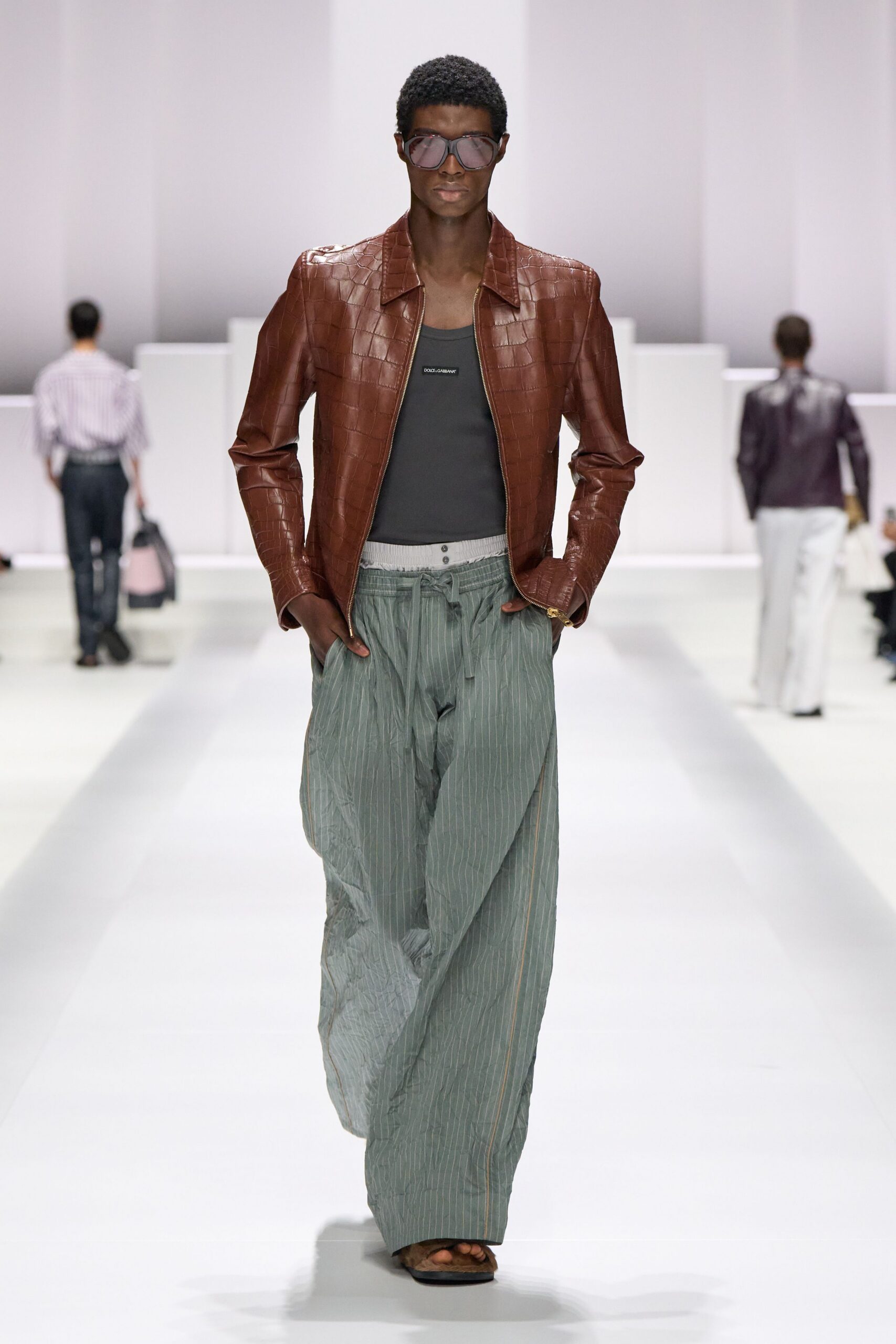 brown leather jacket with gray tank-top