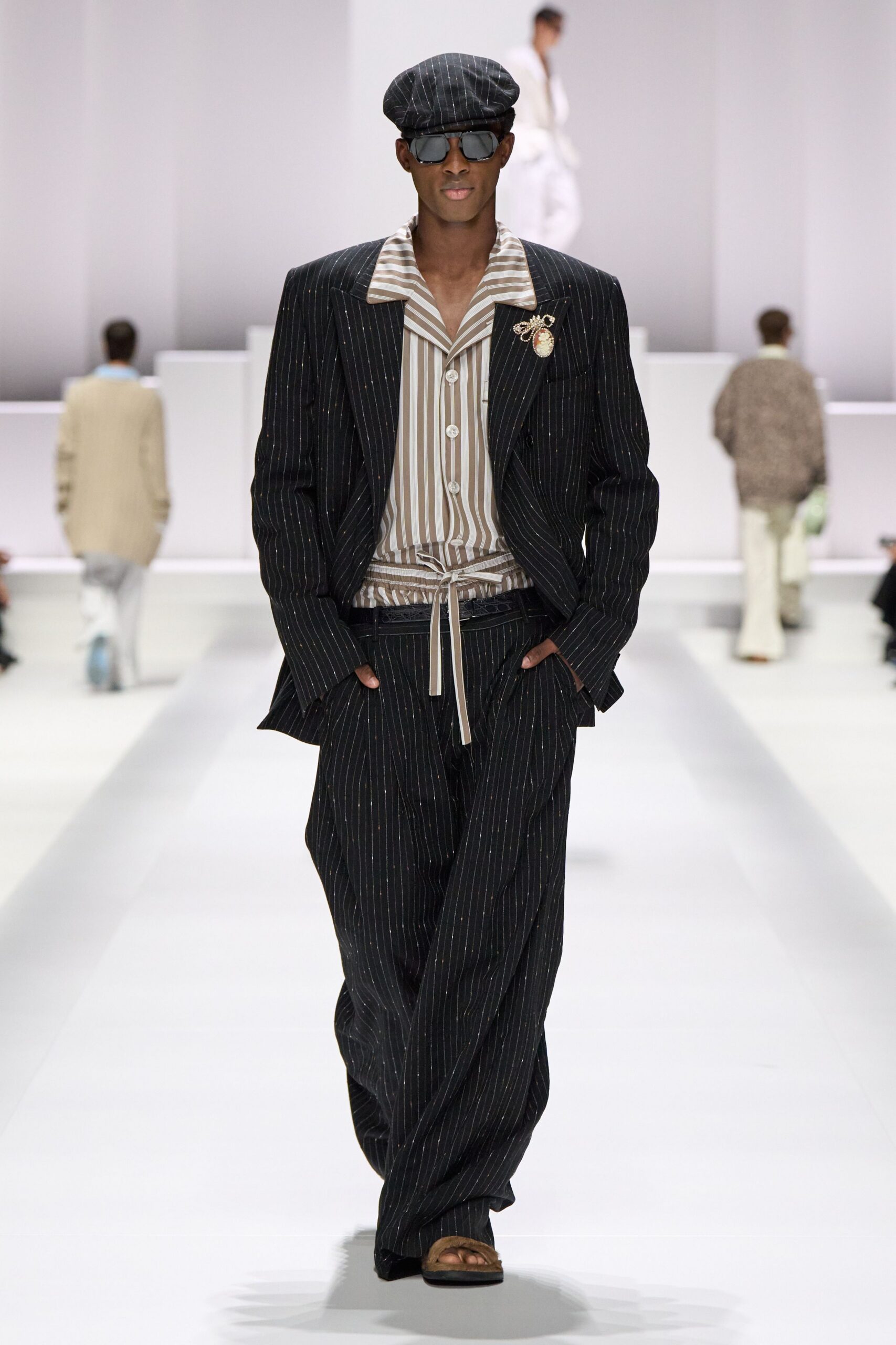 black striped suit with beige shirt