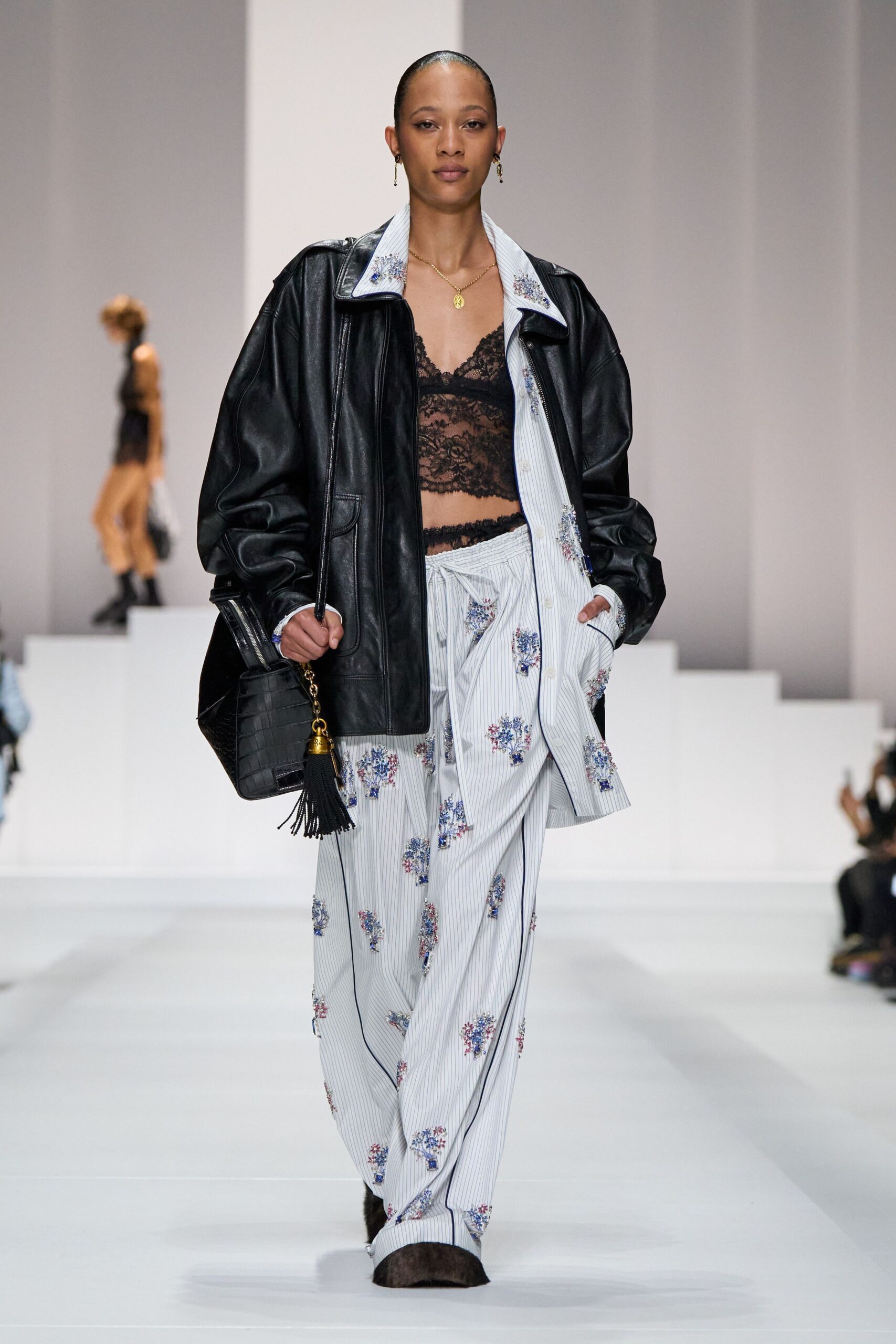 black leather long-sleeve collared oversized jacket
