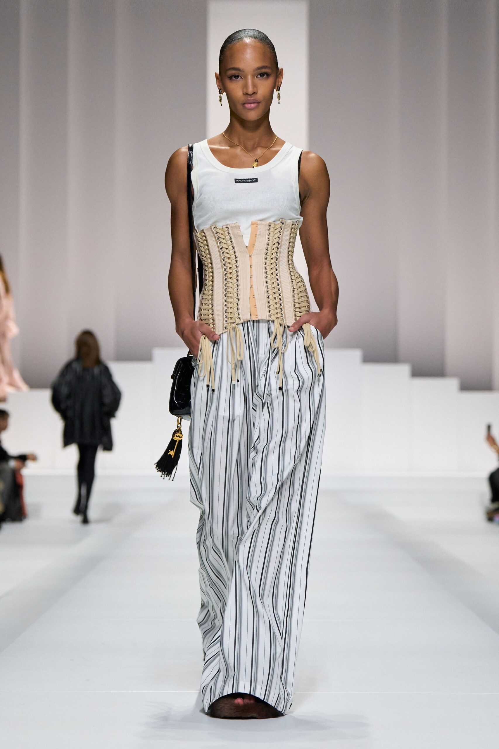 white top beige corset striped pants