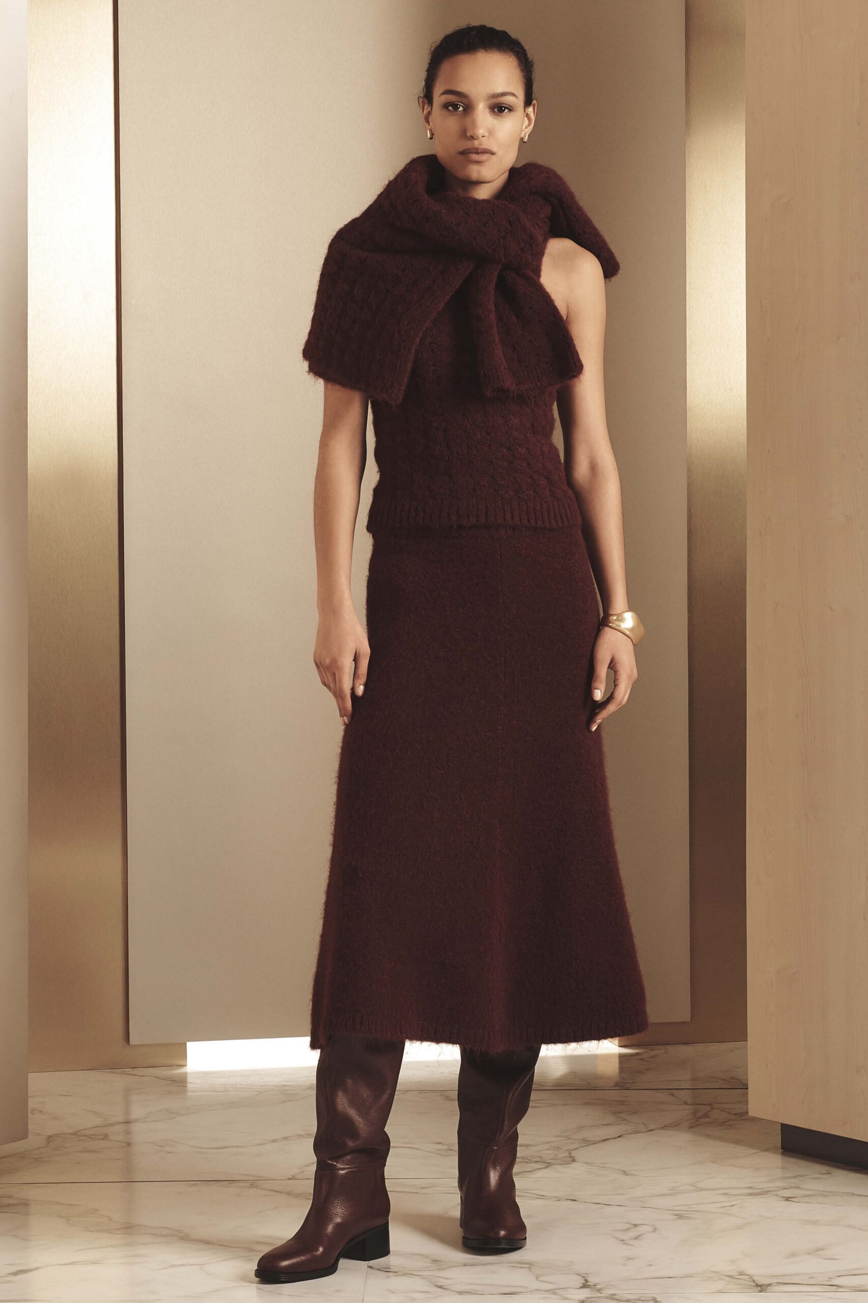 red wool fitted top and skirt