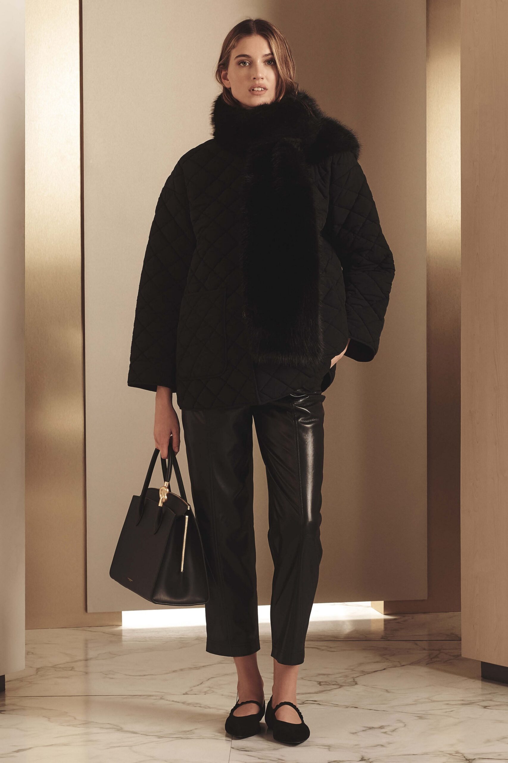black oversized quilted coat