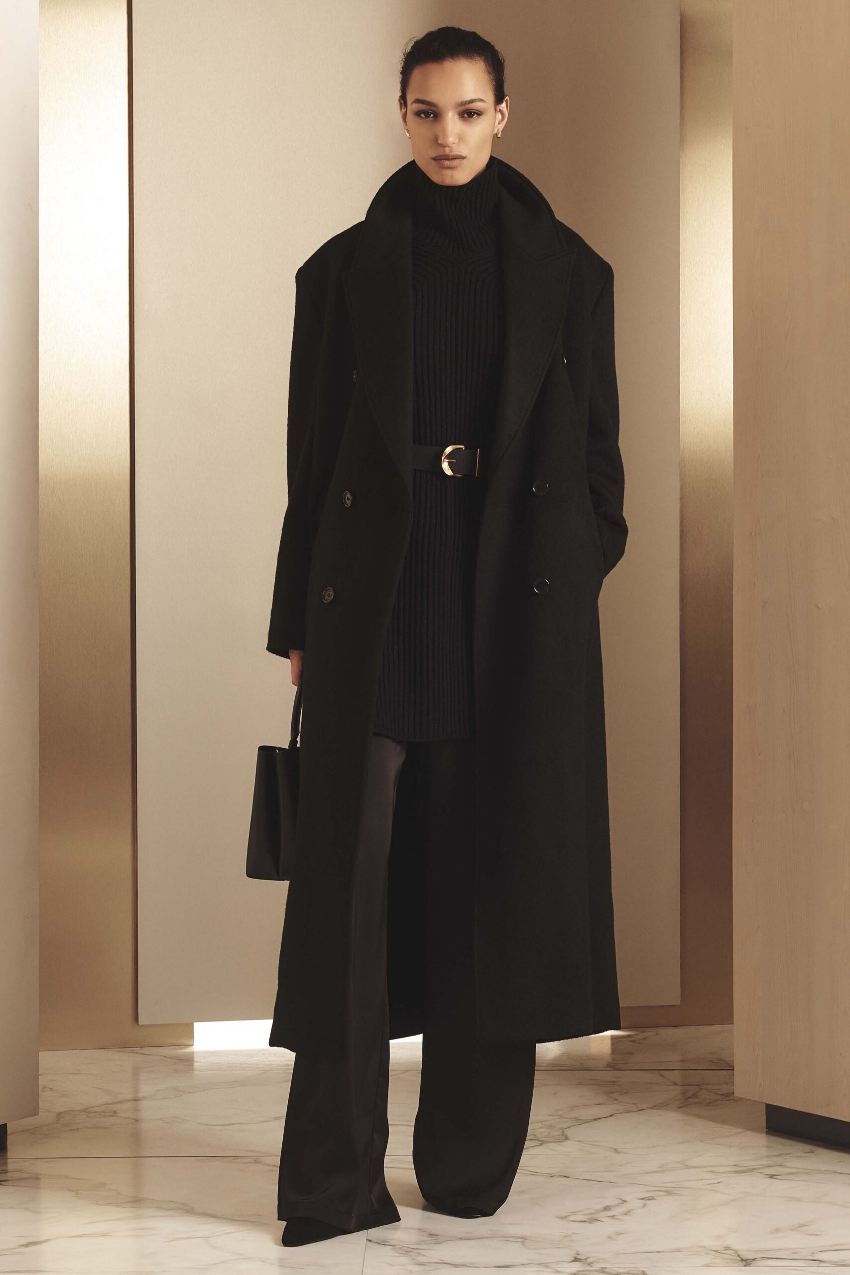 black tailored coat with knit top