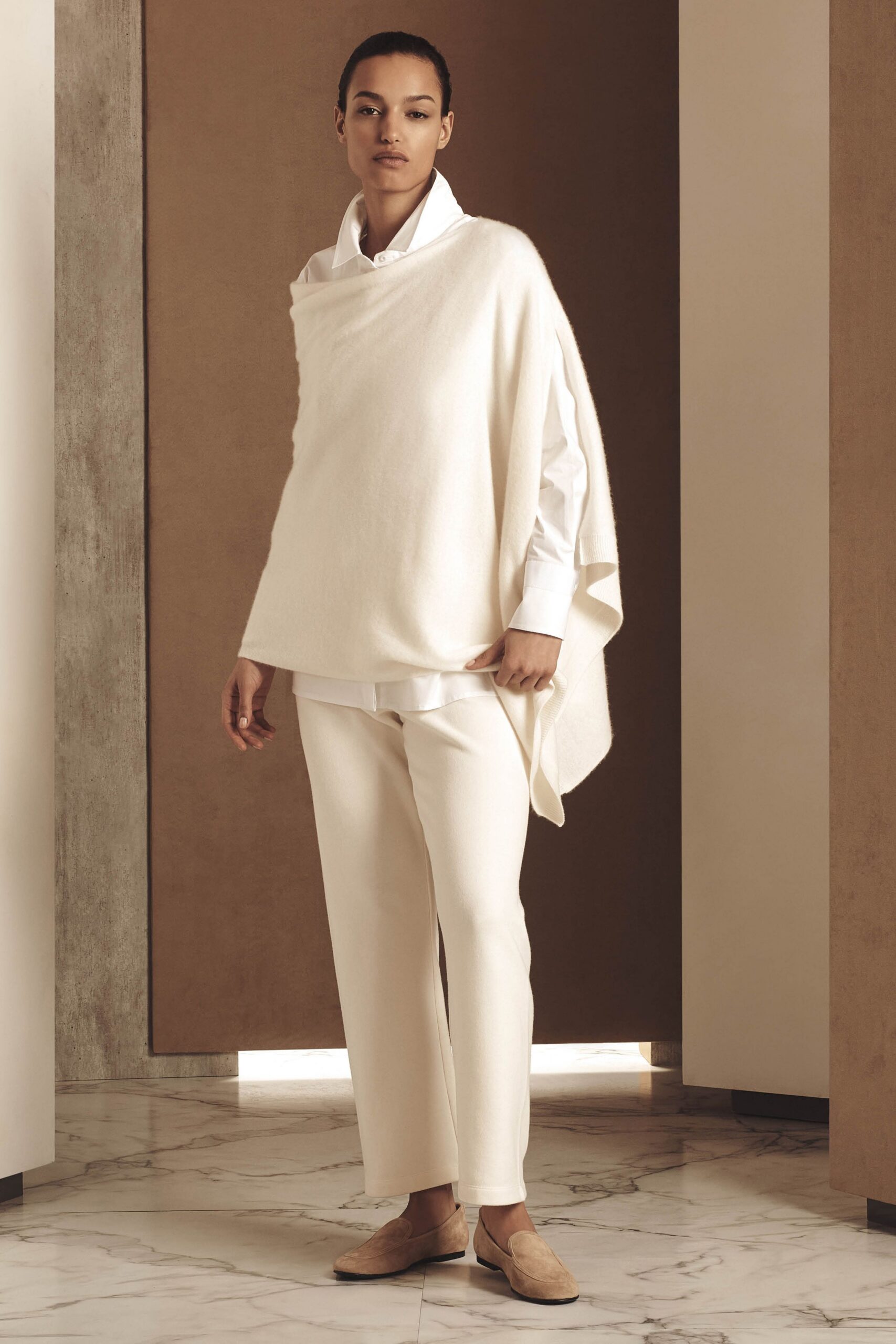 white wool poncho with shirt and pants