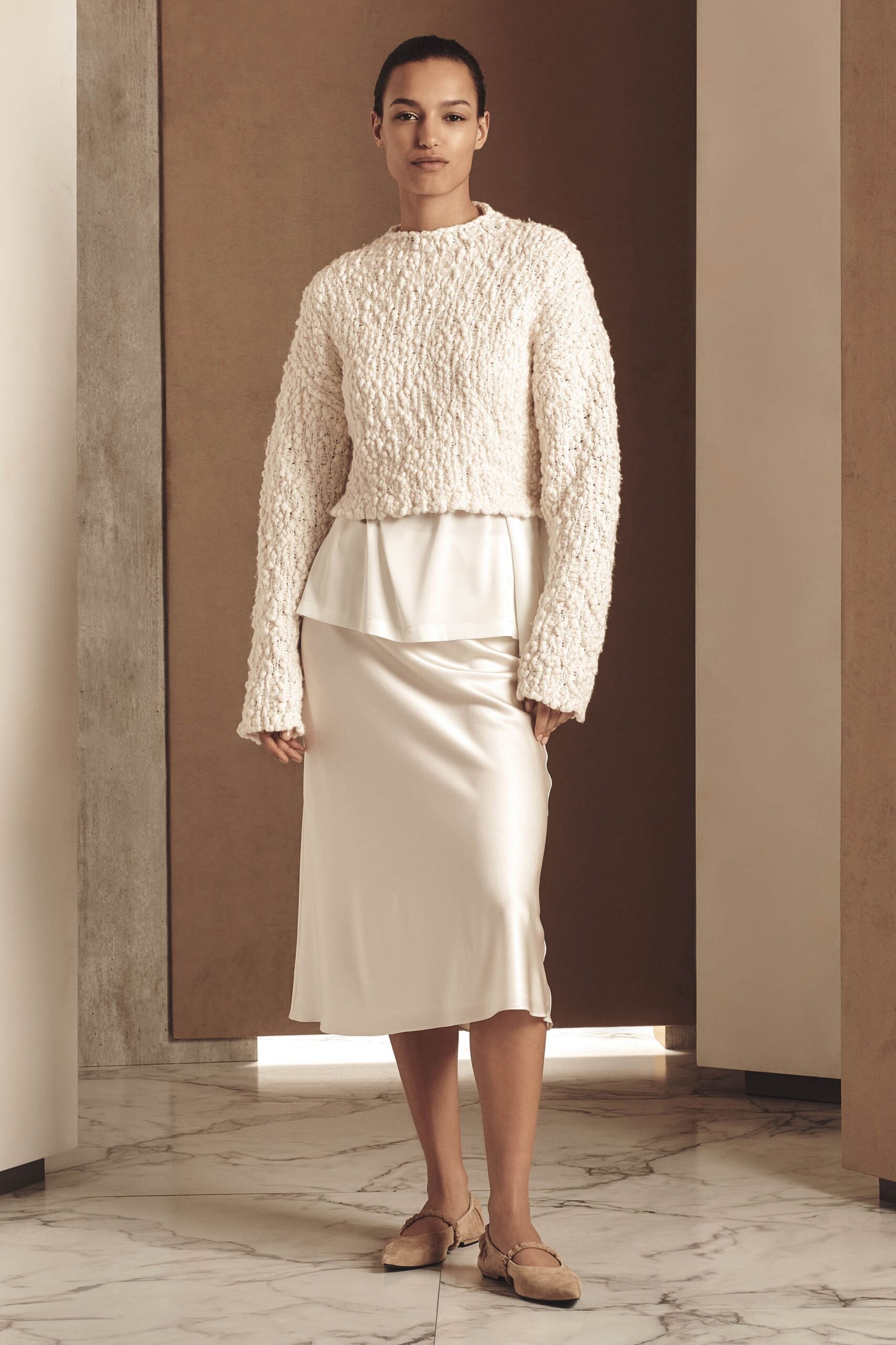 white textured cropped top and ivory midi skirt