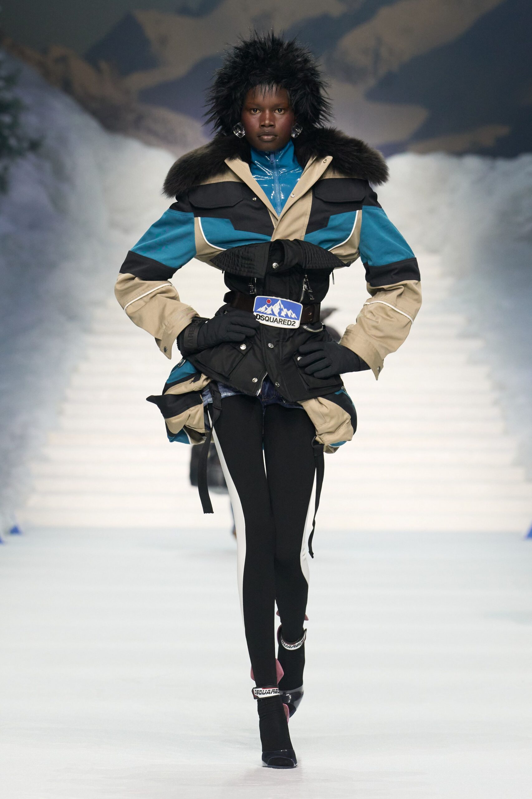 fitted black and blue jacket with gloves