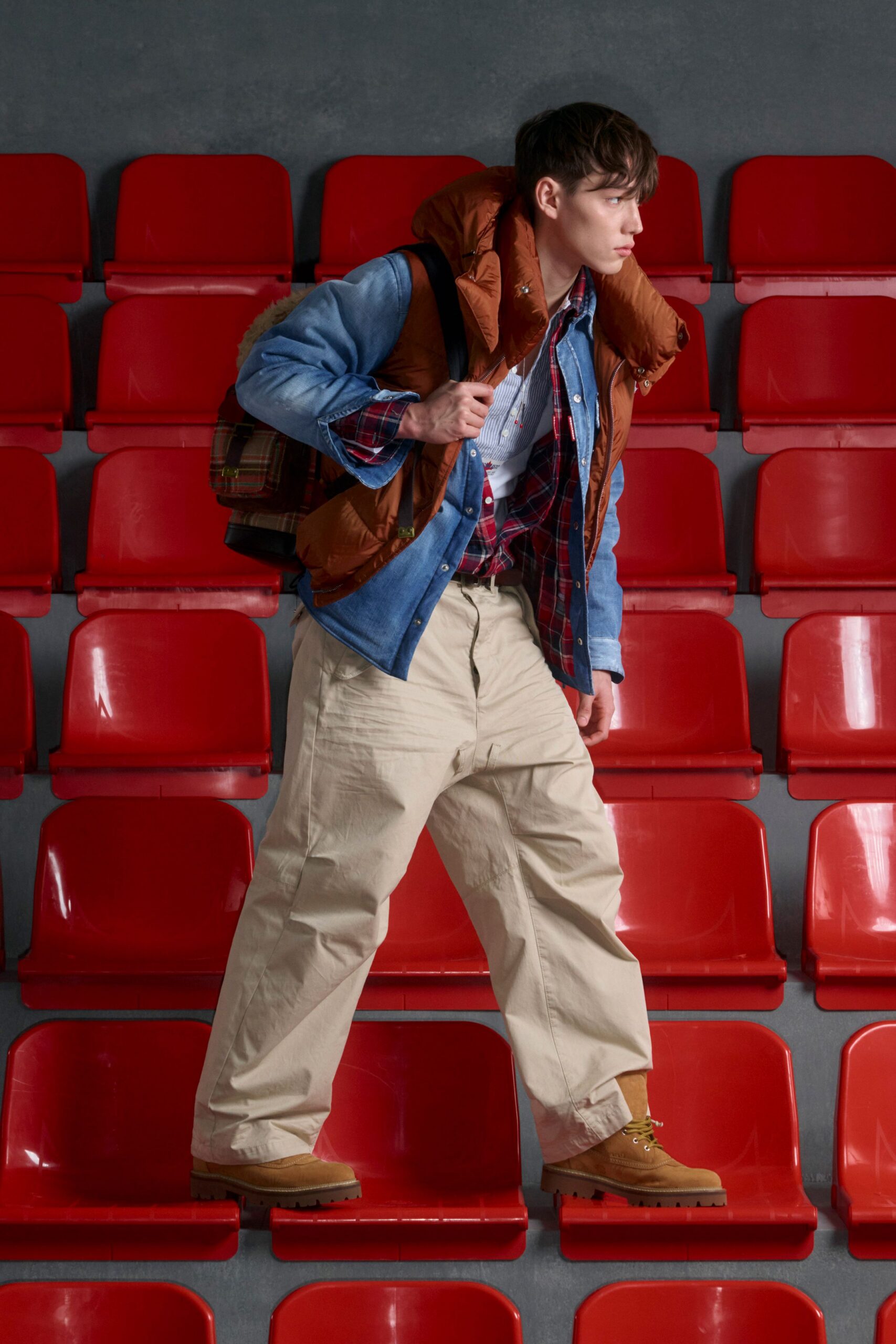 blue denim jacket with brown vest