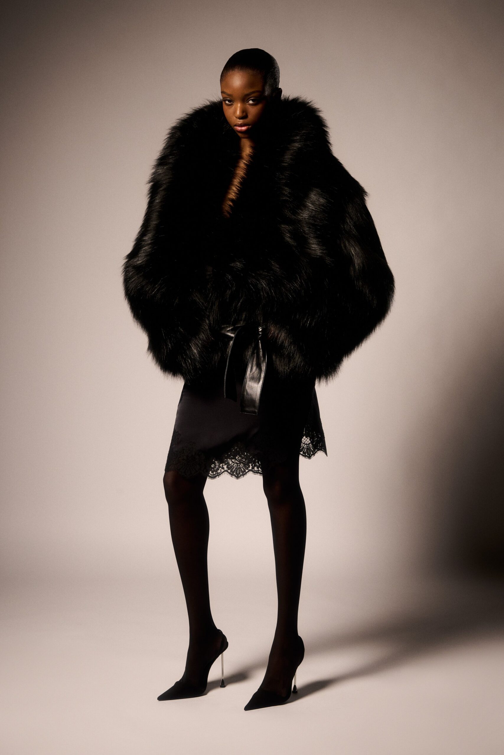black silk fitted high-waisted mini skirt