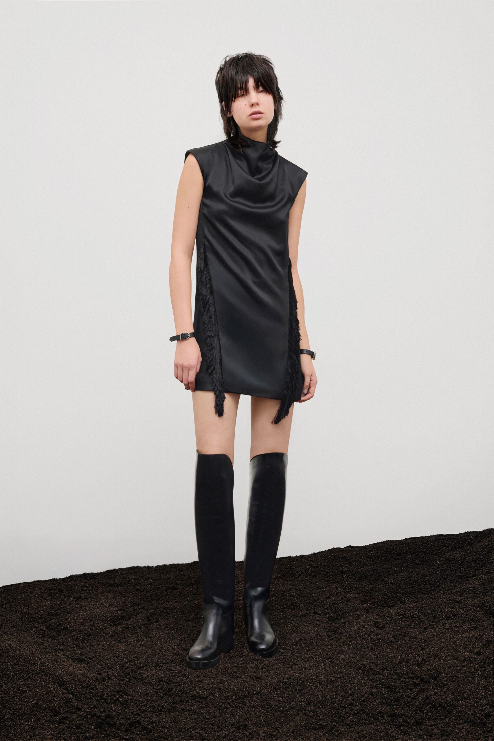 black silk sleeveless high-neck fitted draped fringed dress