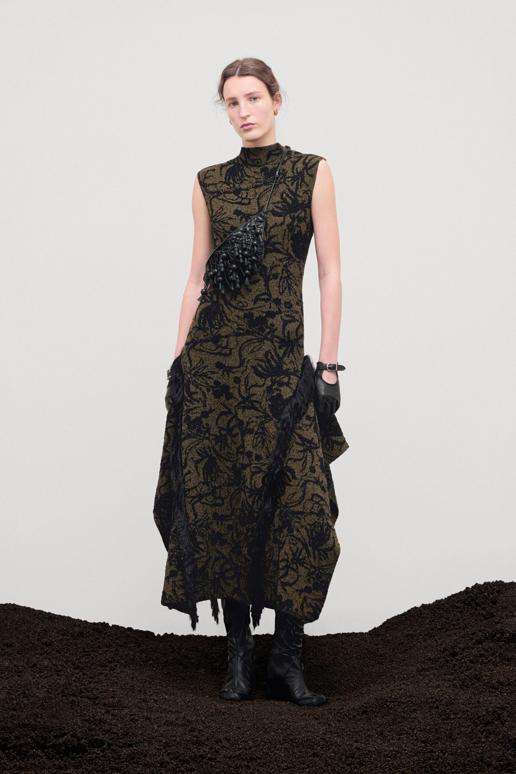 black and gold draped midi dress