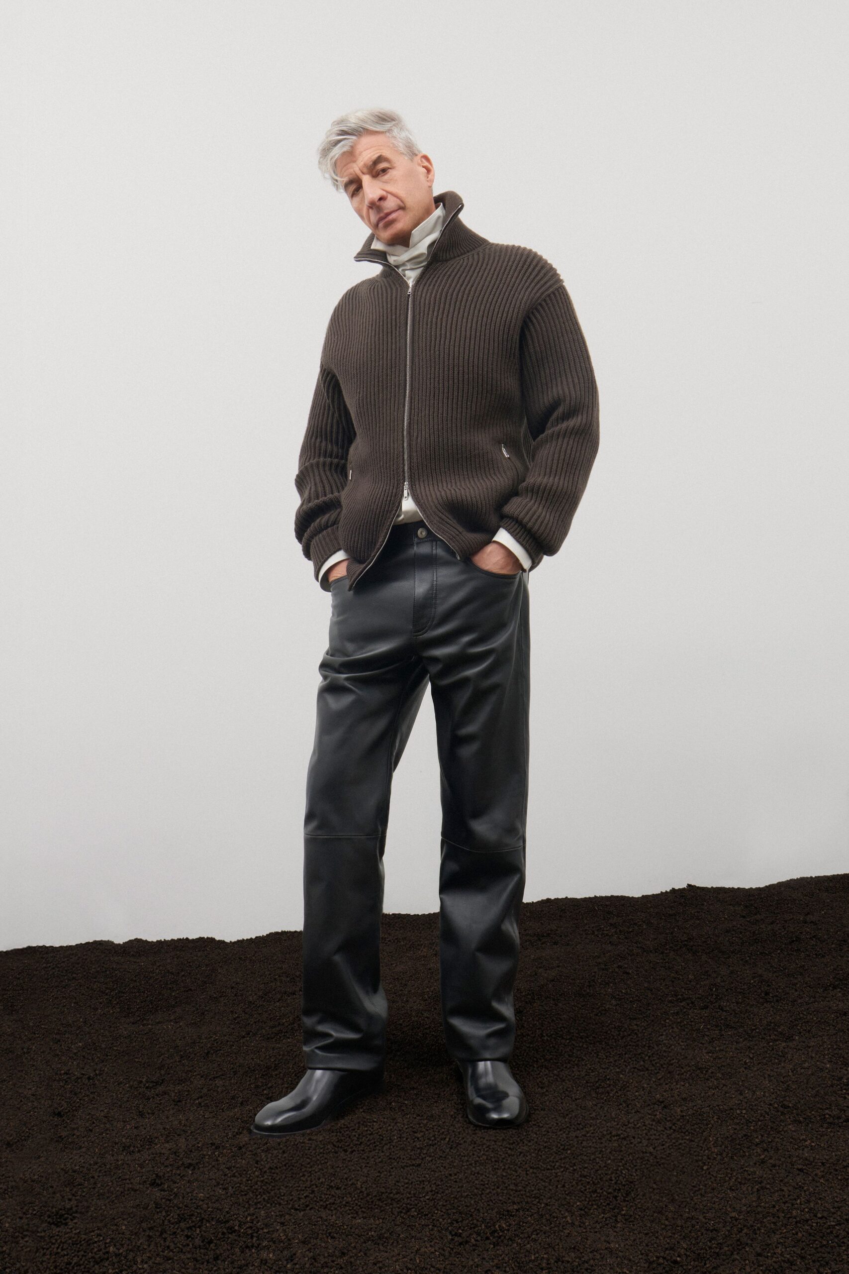 brown relaxed sweater black leather pants