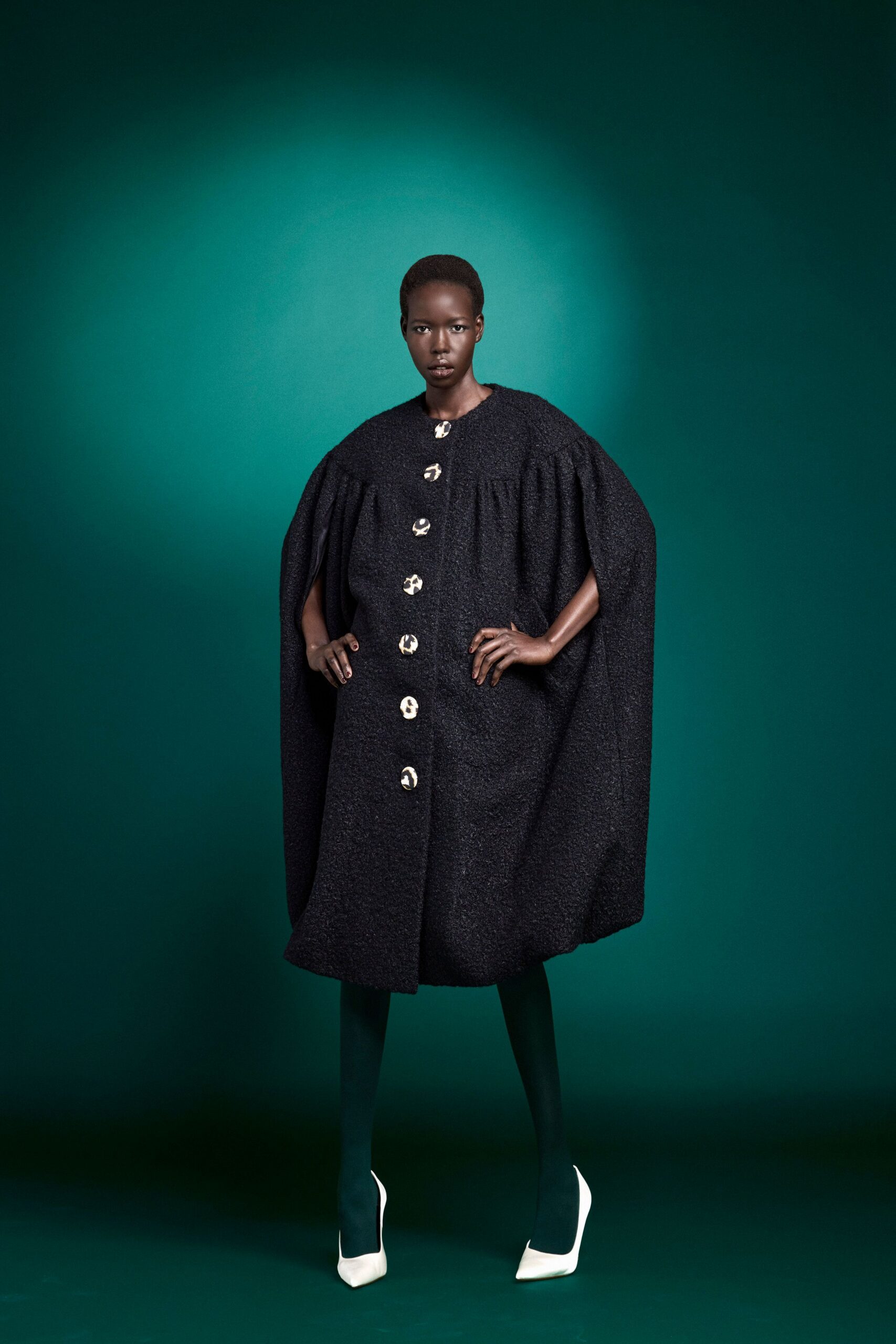 black wool long-sleeve collared relaxed buttoned short cape