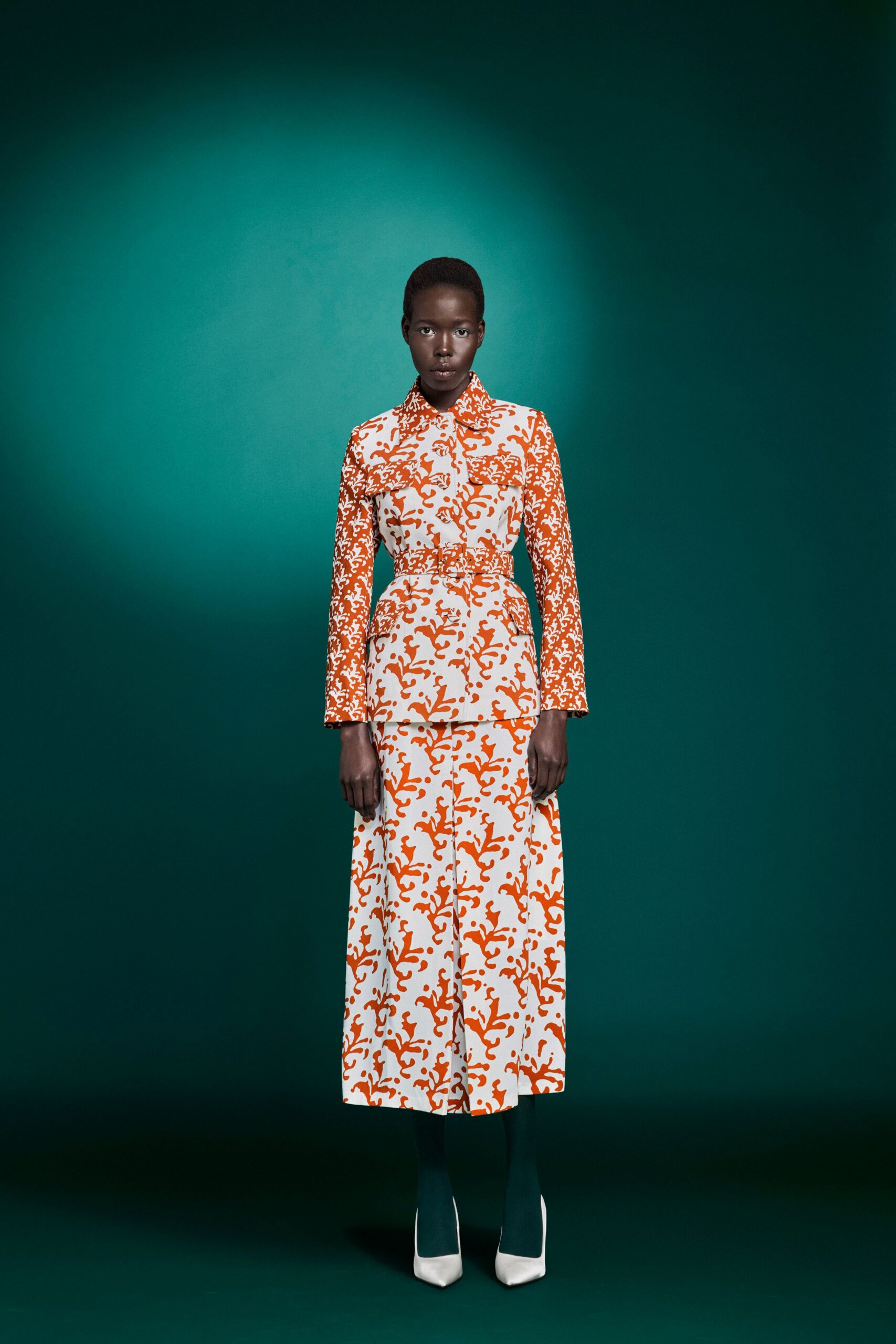 white cotton long-sleeve collared fitted printed tiered dress