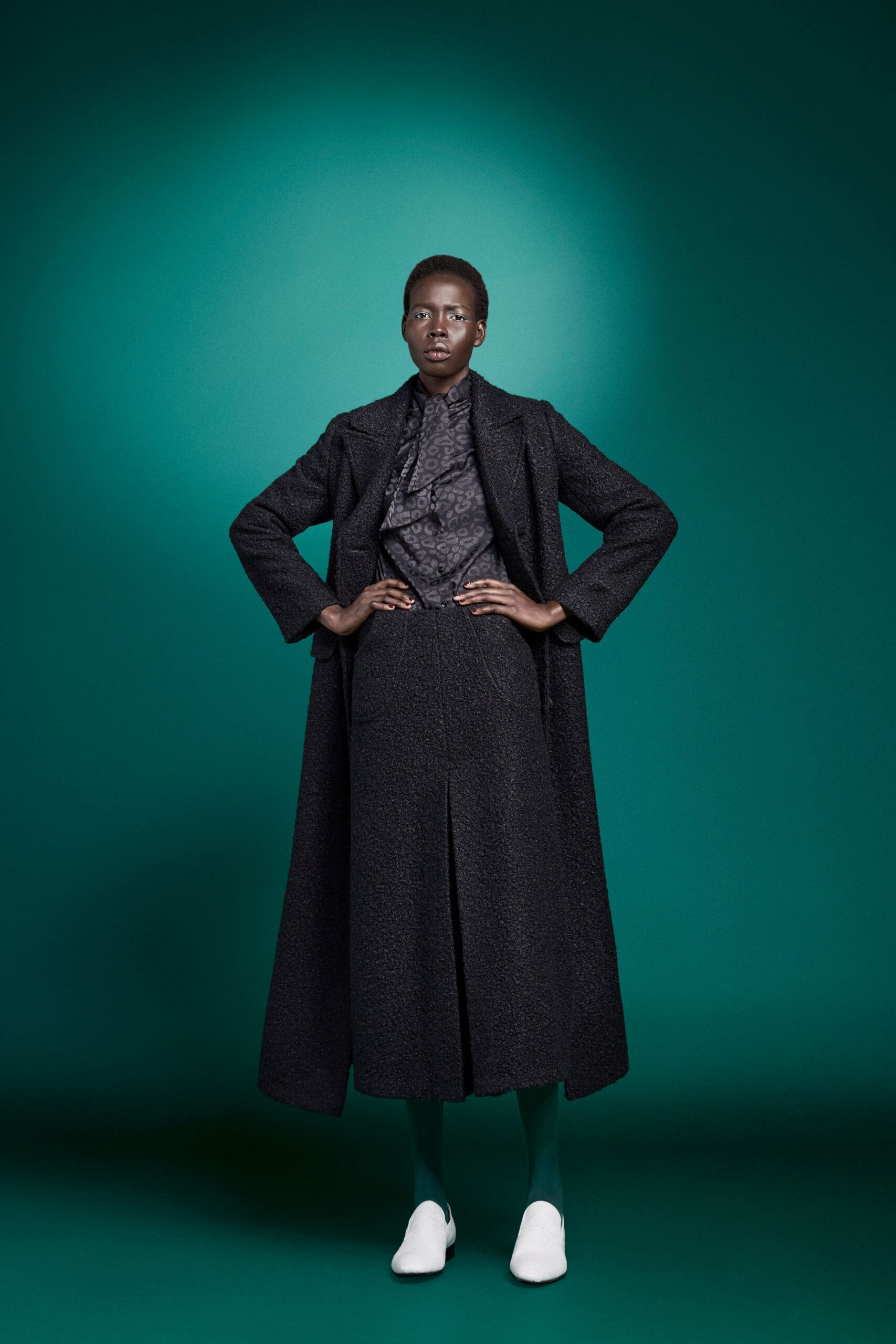 black wool long-sleeve collared relaxed buttoned maxi coat