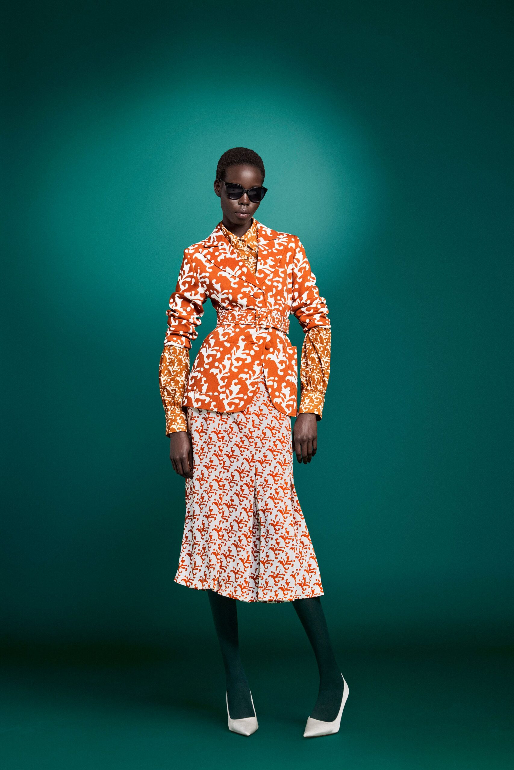 orange long-sleeve collared fitted printed shirt