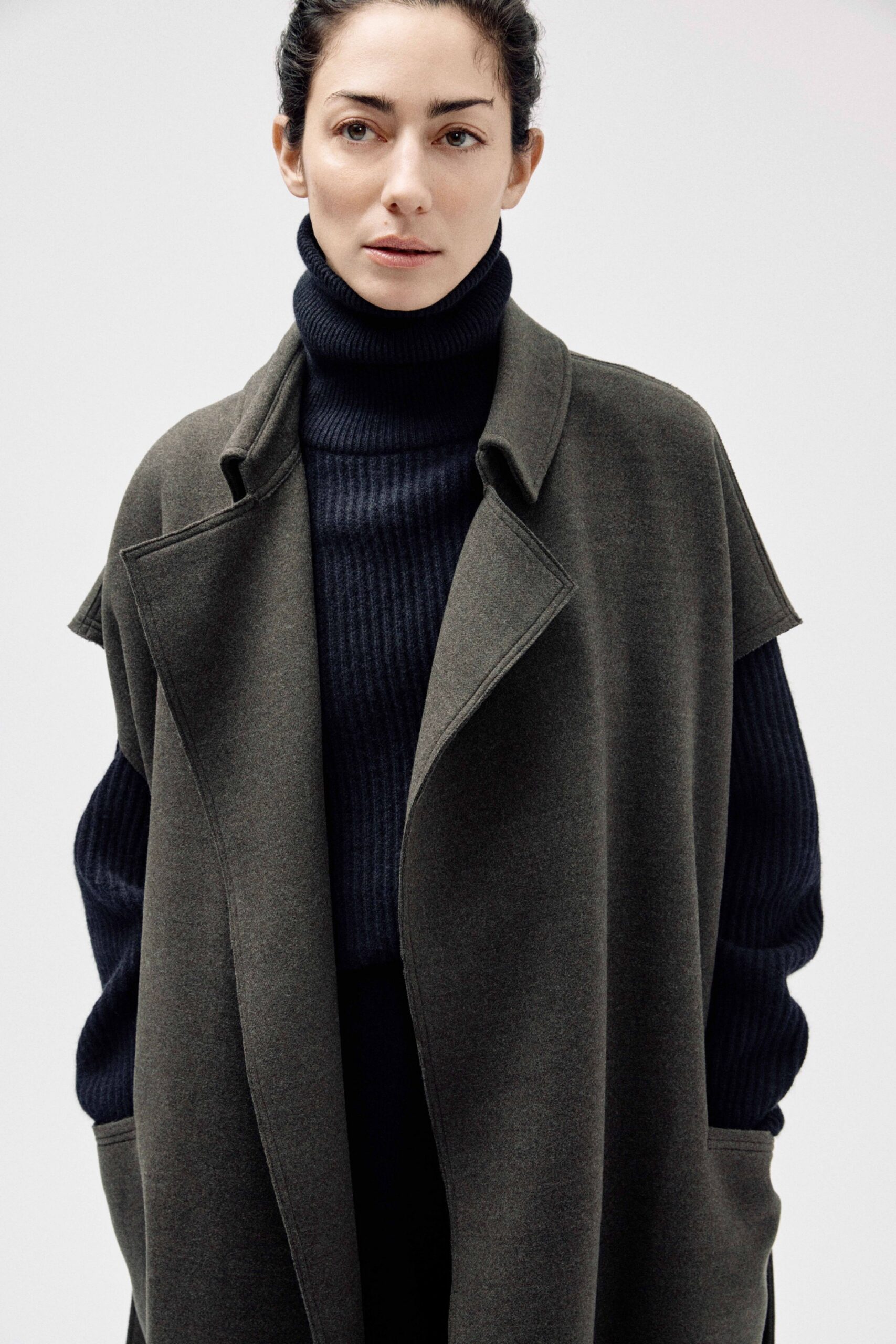 blue knit turtleneck long-sleeve fitted ribbed sweater