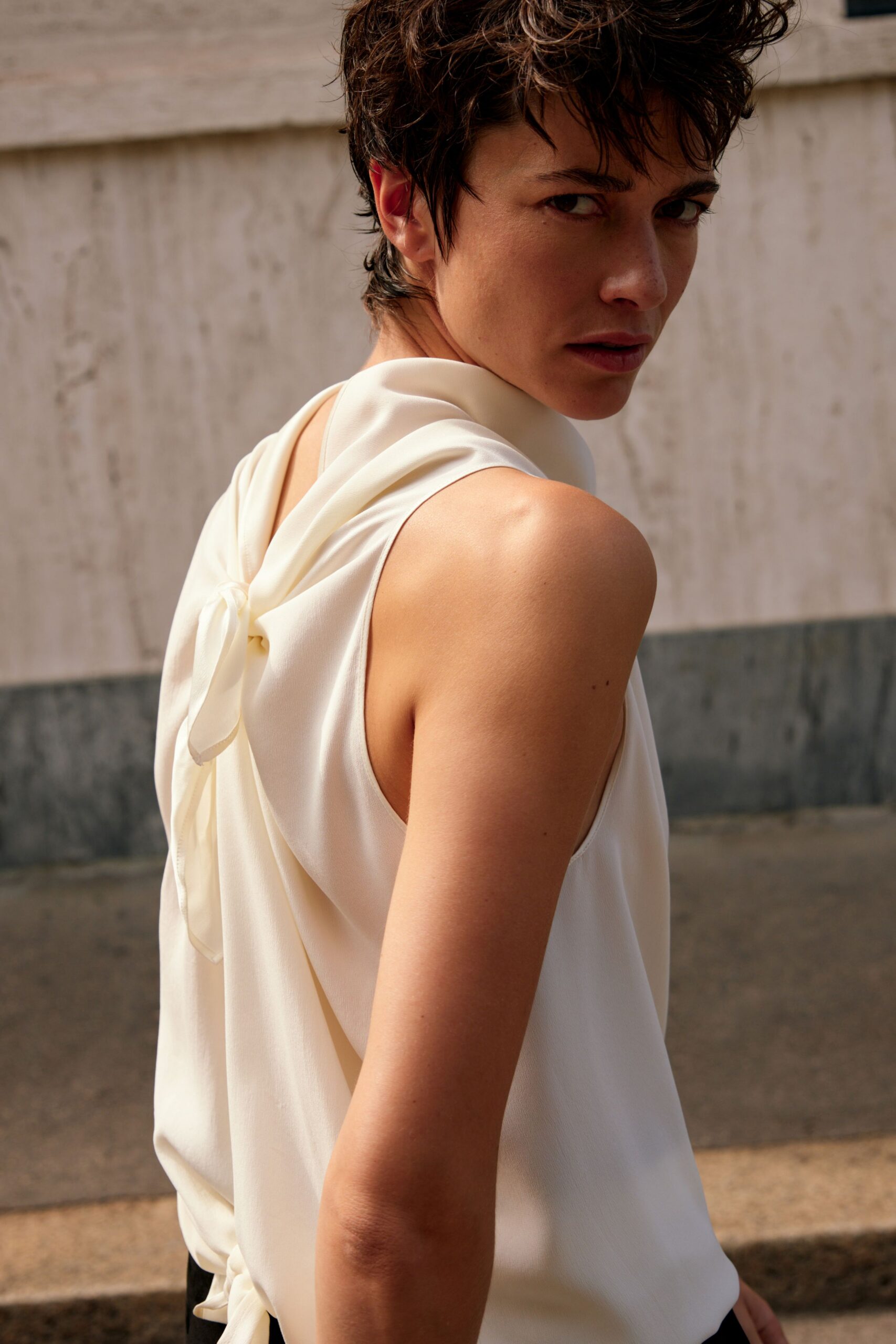 fitted white silk sleeveless top