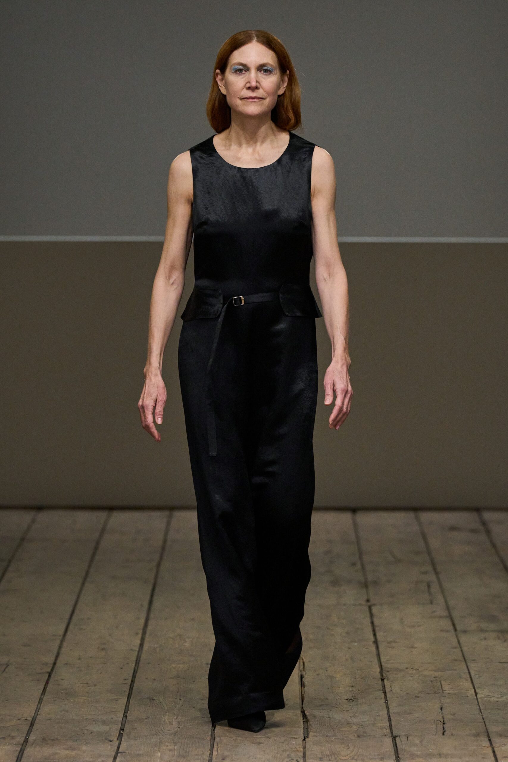 black silk sleeveless v-neck fitted belted jumpsuit
