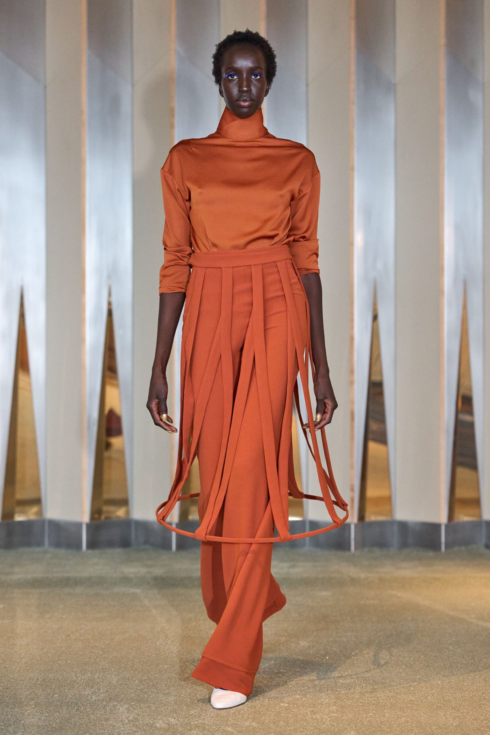 orange silk long-sleeve high-neck fitted pleated top