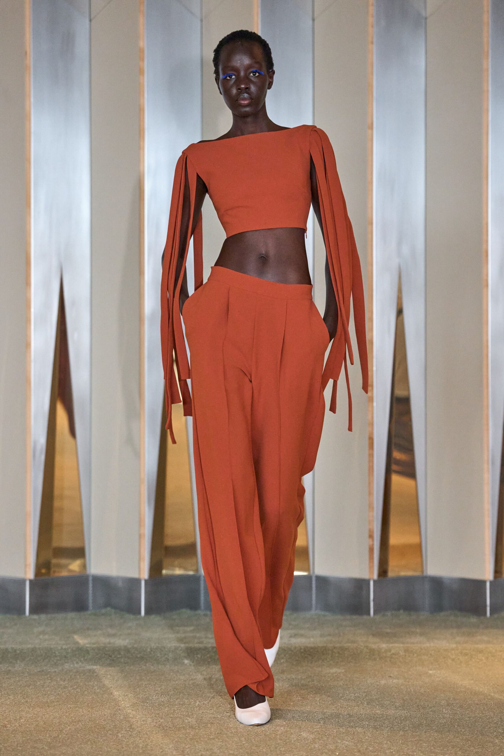 orange relaxed pleated pants