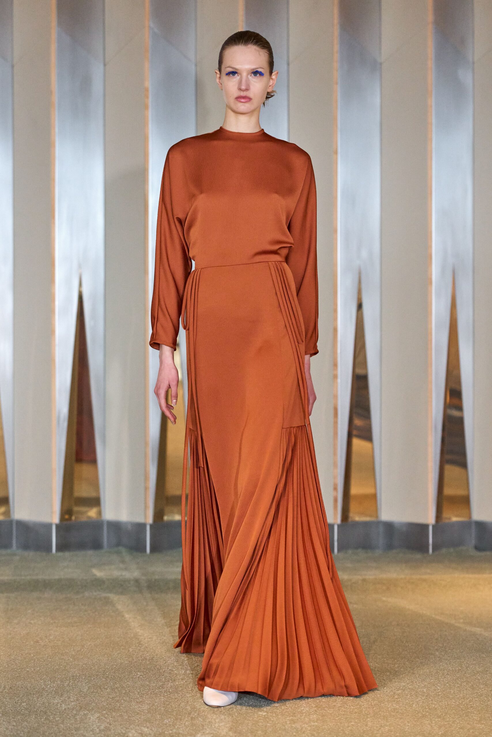 orange silk long-sleeve fitted pleated maxi gown