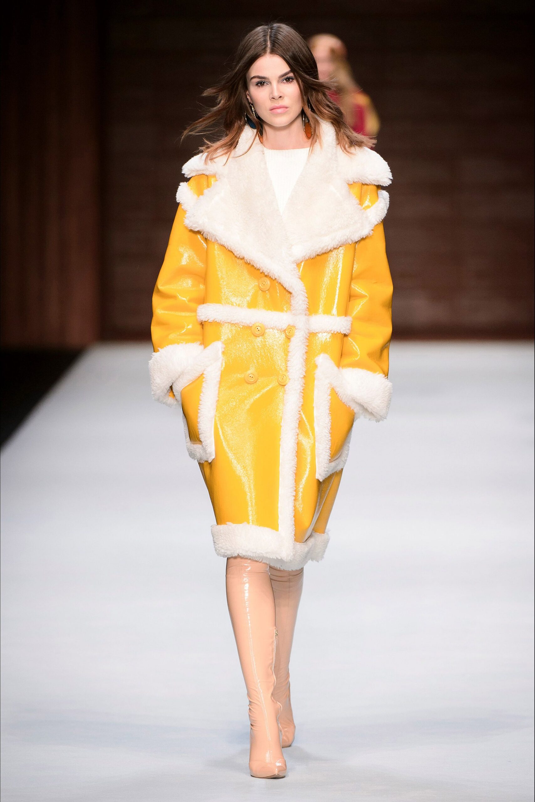 yellow vinyl long-sleeve collared fitted zippered shiny coat