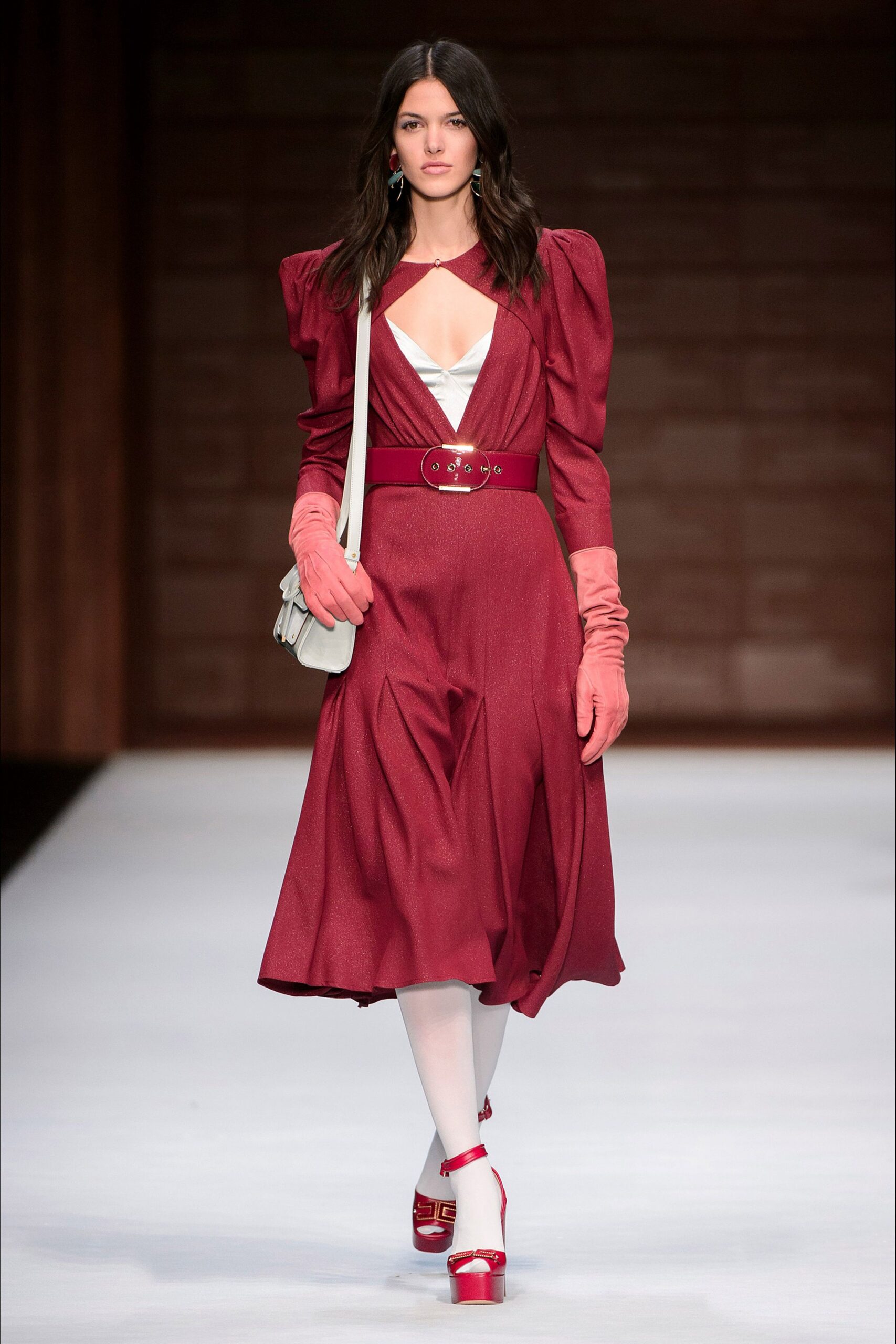 red silk long-sleeve v-neck fitted pleated belted dress