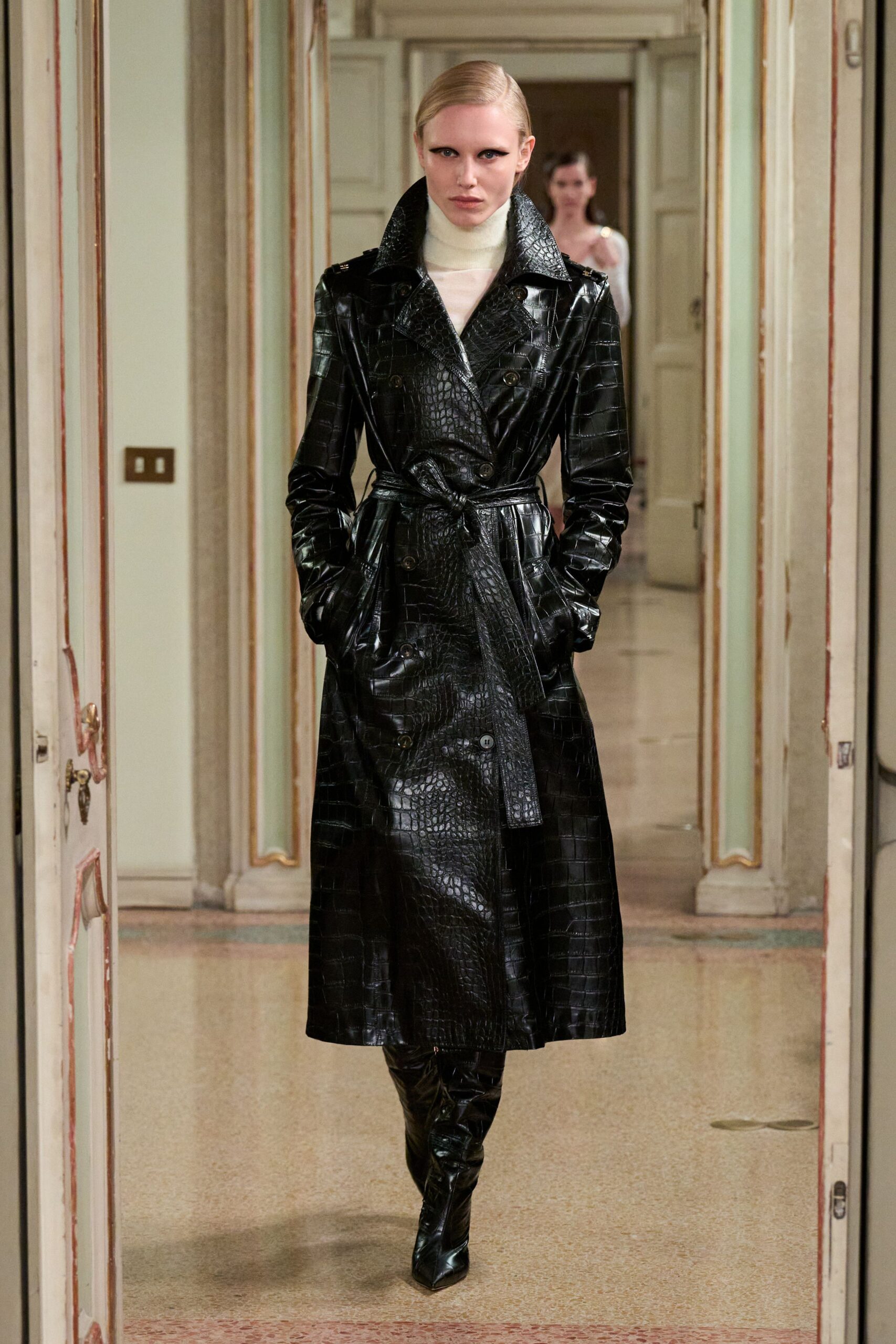black leather long-sleeve collared fitted zippered belted trench