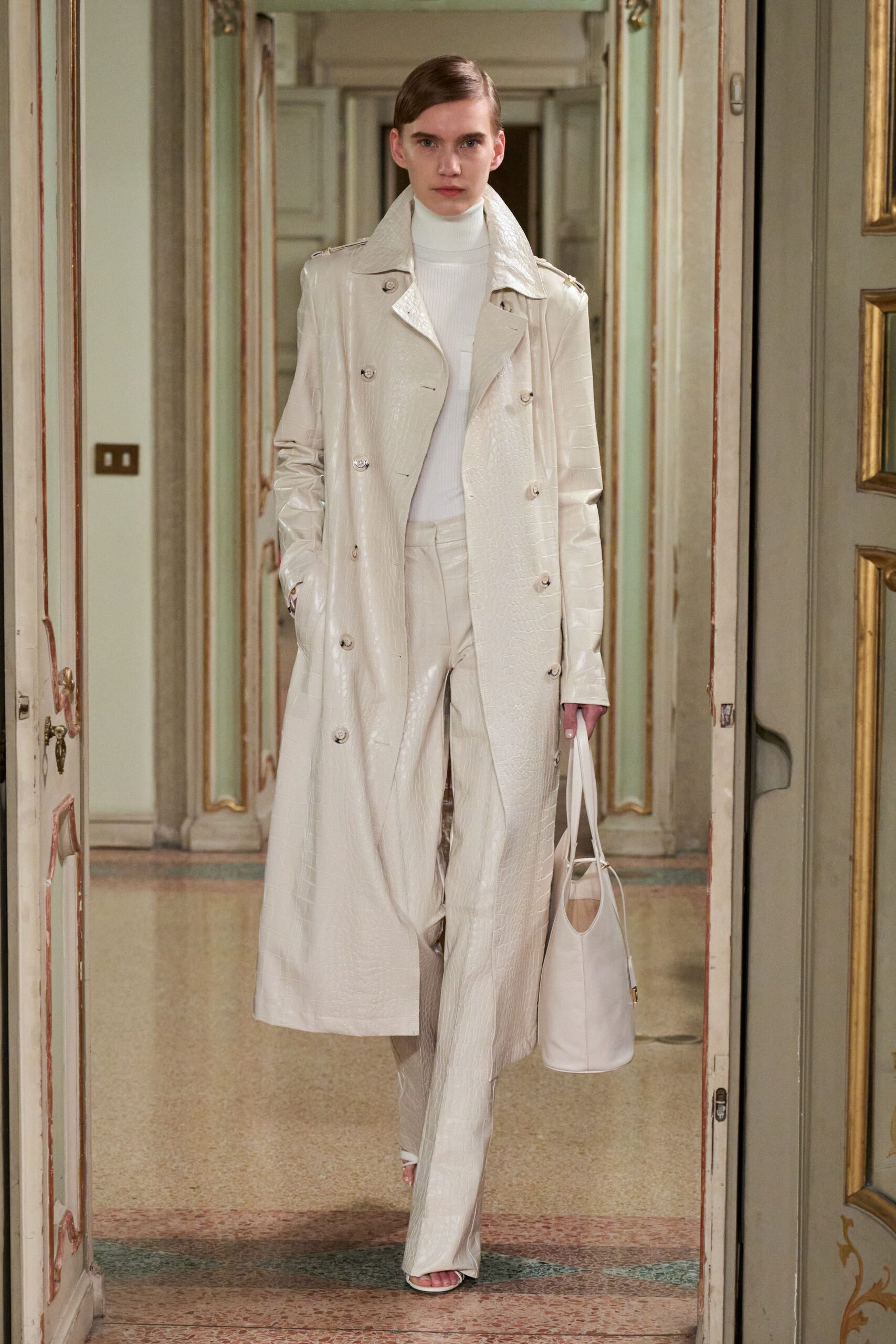 white silk long-sleeve collared fitted zippered shiny trench