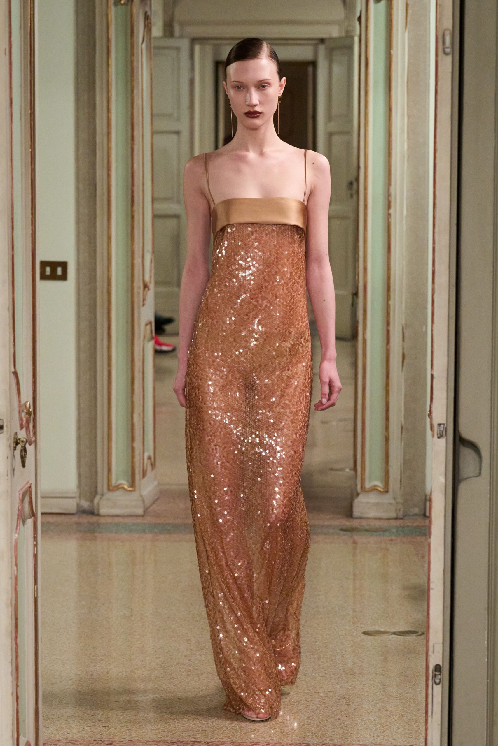 gold sequin sleeveless gown