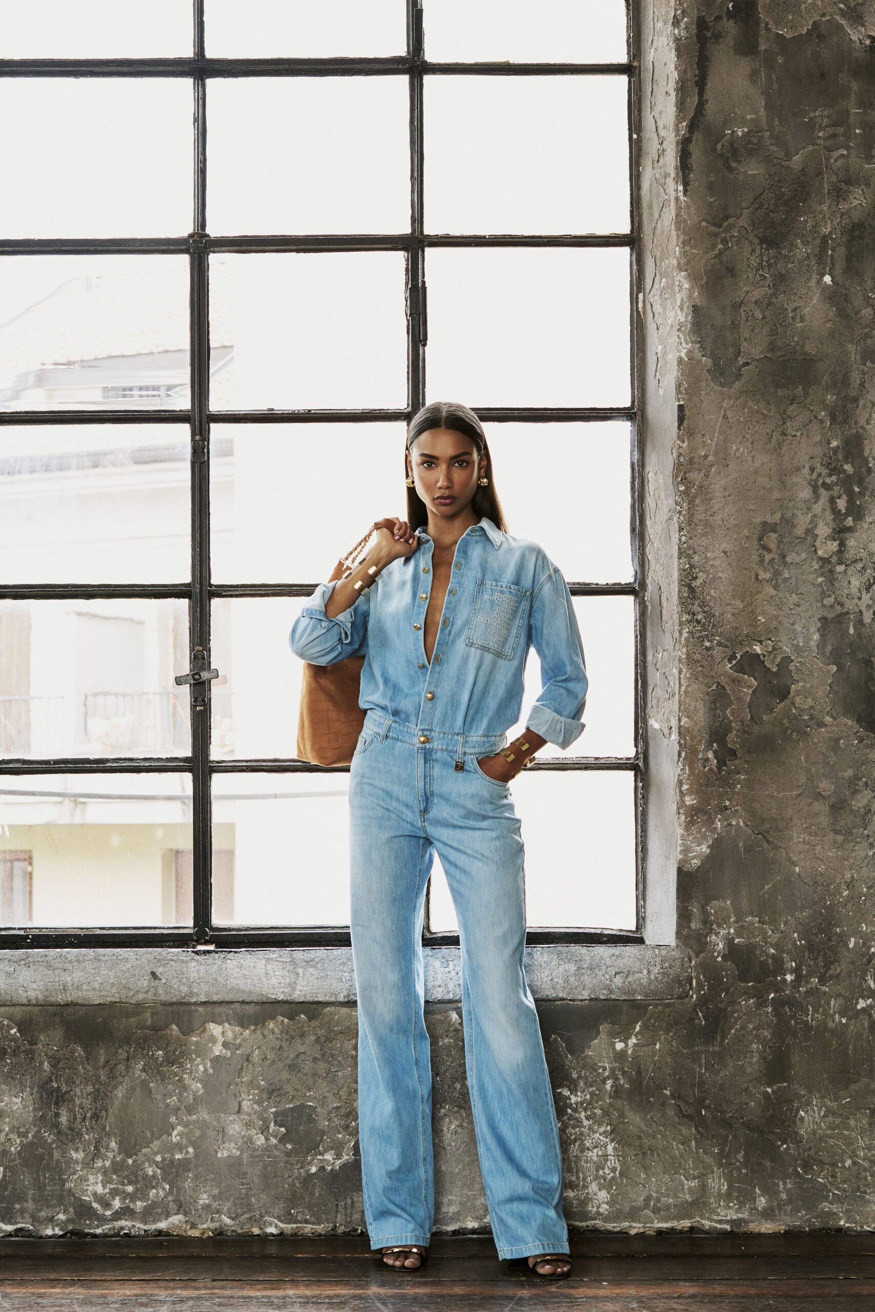blue denim fitted jumpsuit