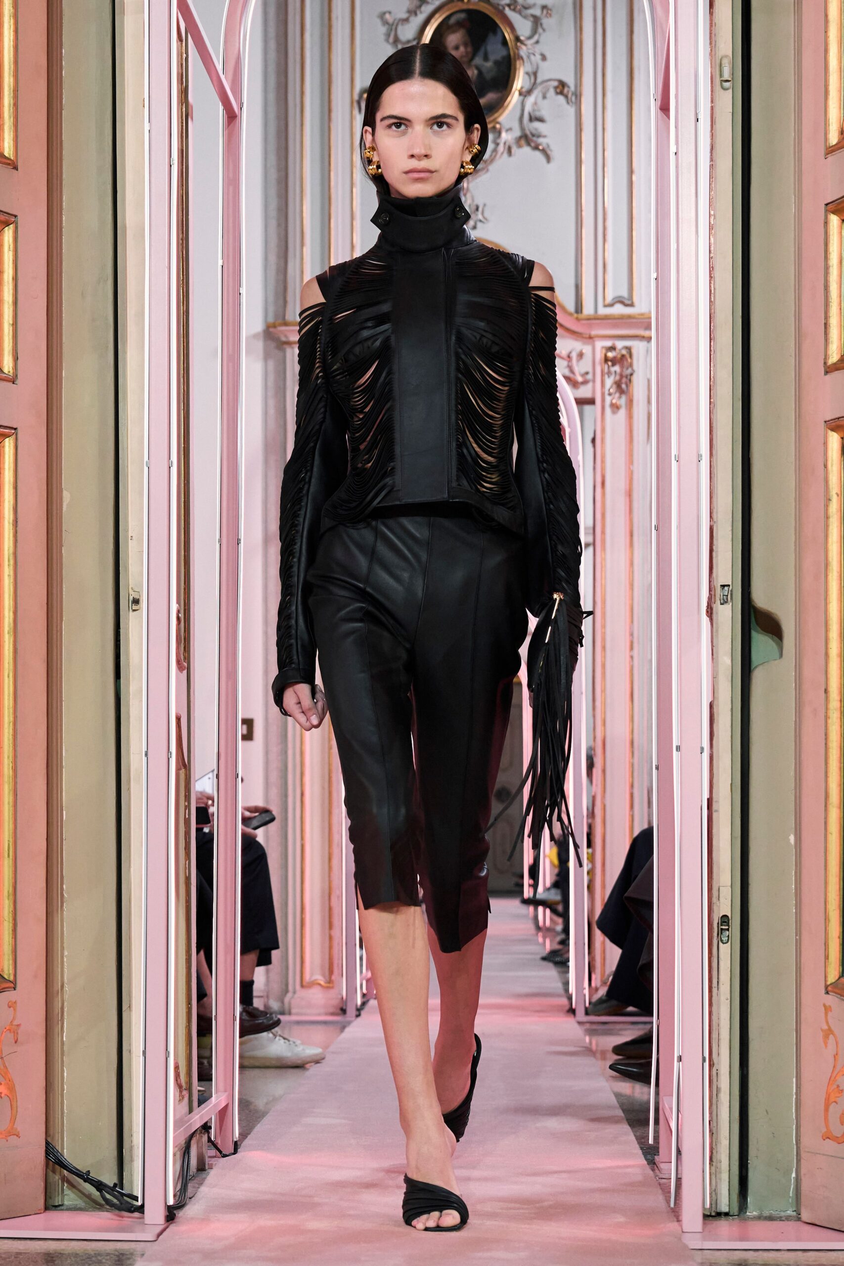 black leather fitted top and pants