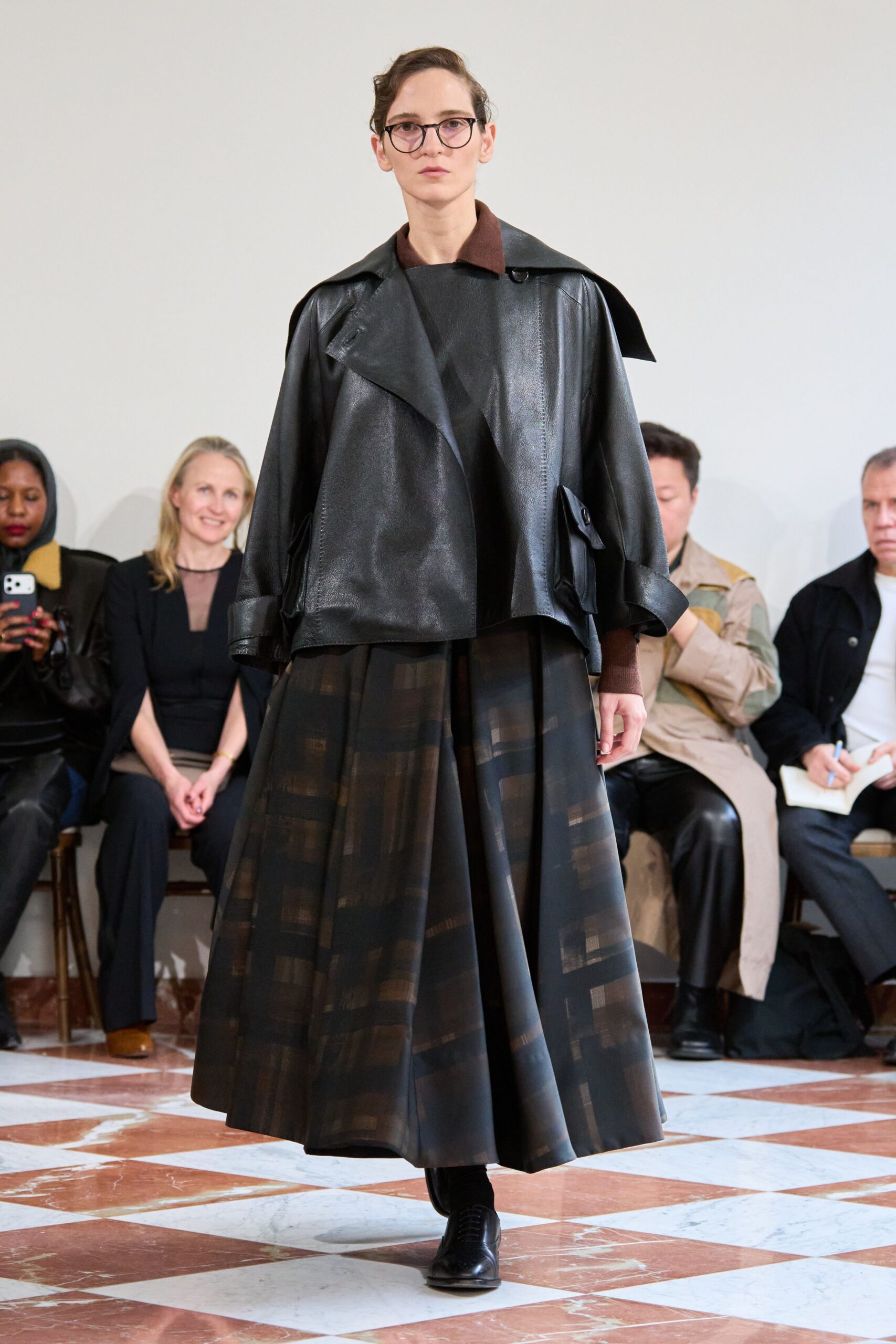 black leather long-sleeve collared relaxed zippered shiny jacket