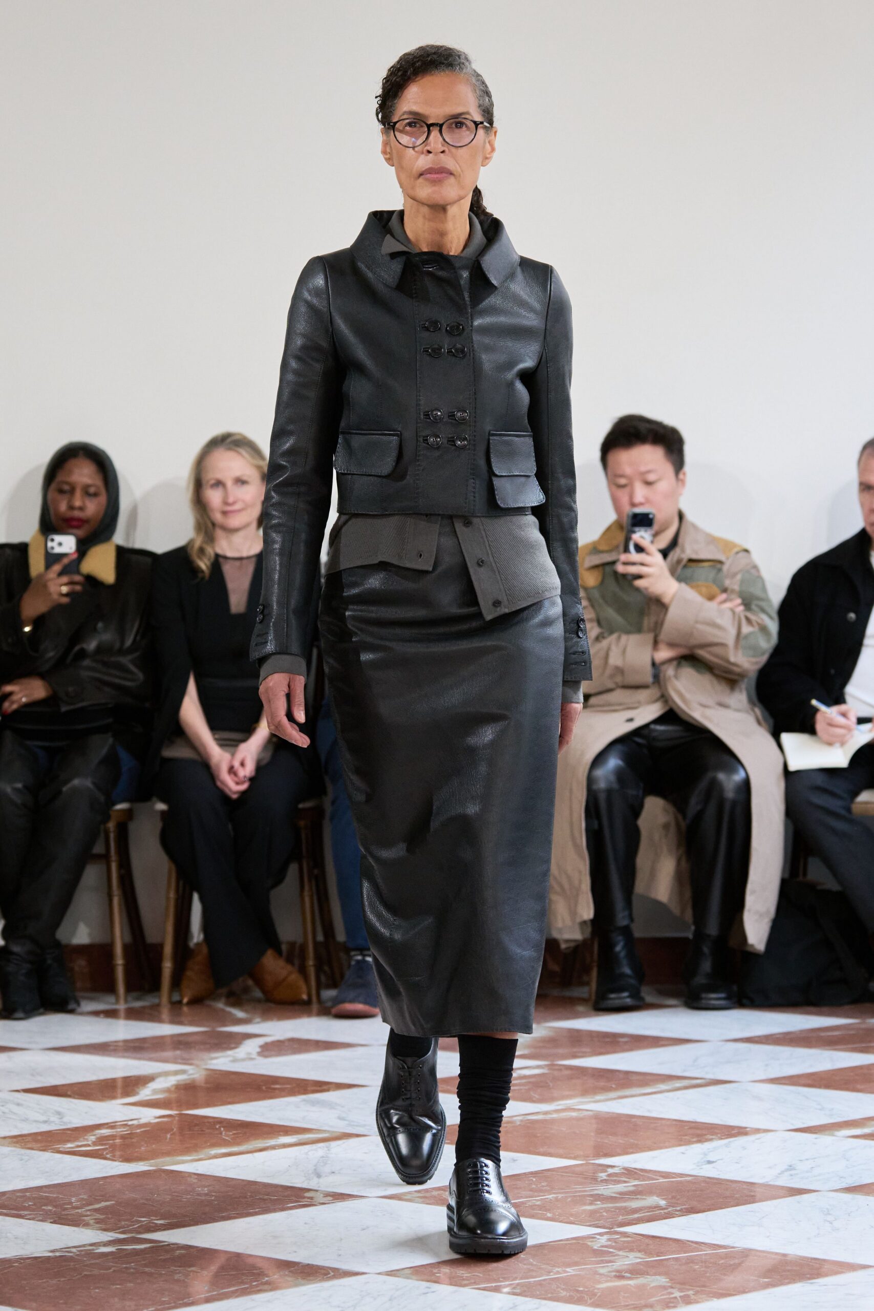 black leather long-sleeve collared fitted buttoned jacket